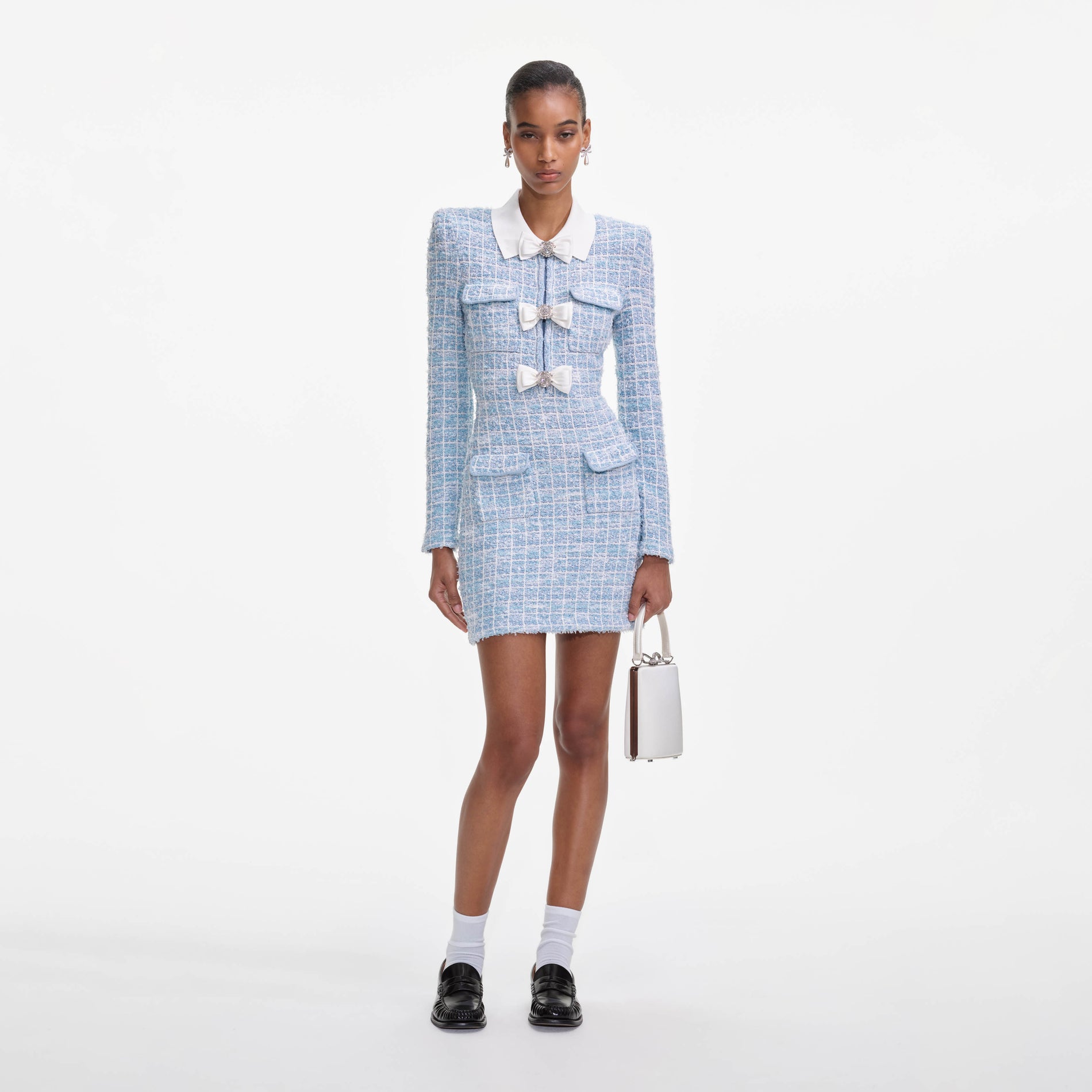 Front view of a woman wearing the Blue Check Collared Knit Mini Dress