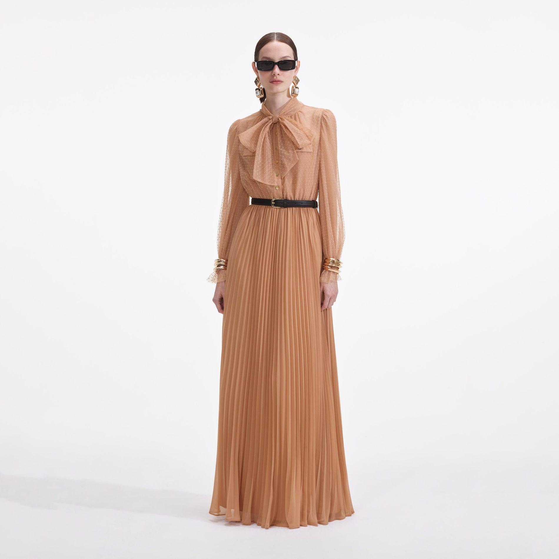 Front view of a woman wearing the Tan Dot Mesh Maxi Dress