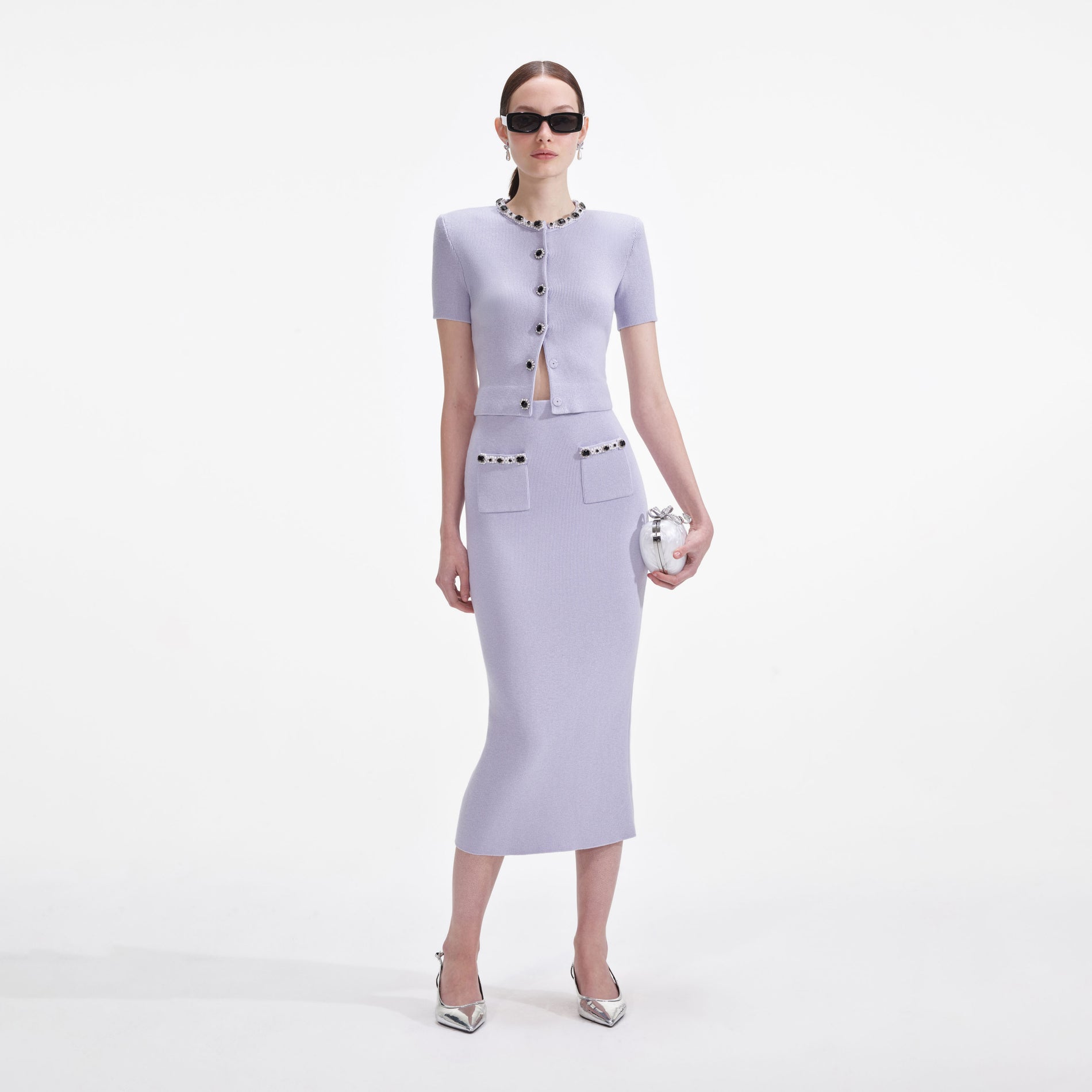 Front view of a woman wearing the Lilac Embellished Knit Top