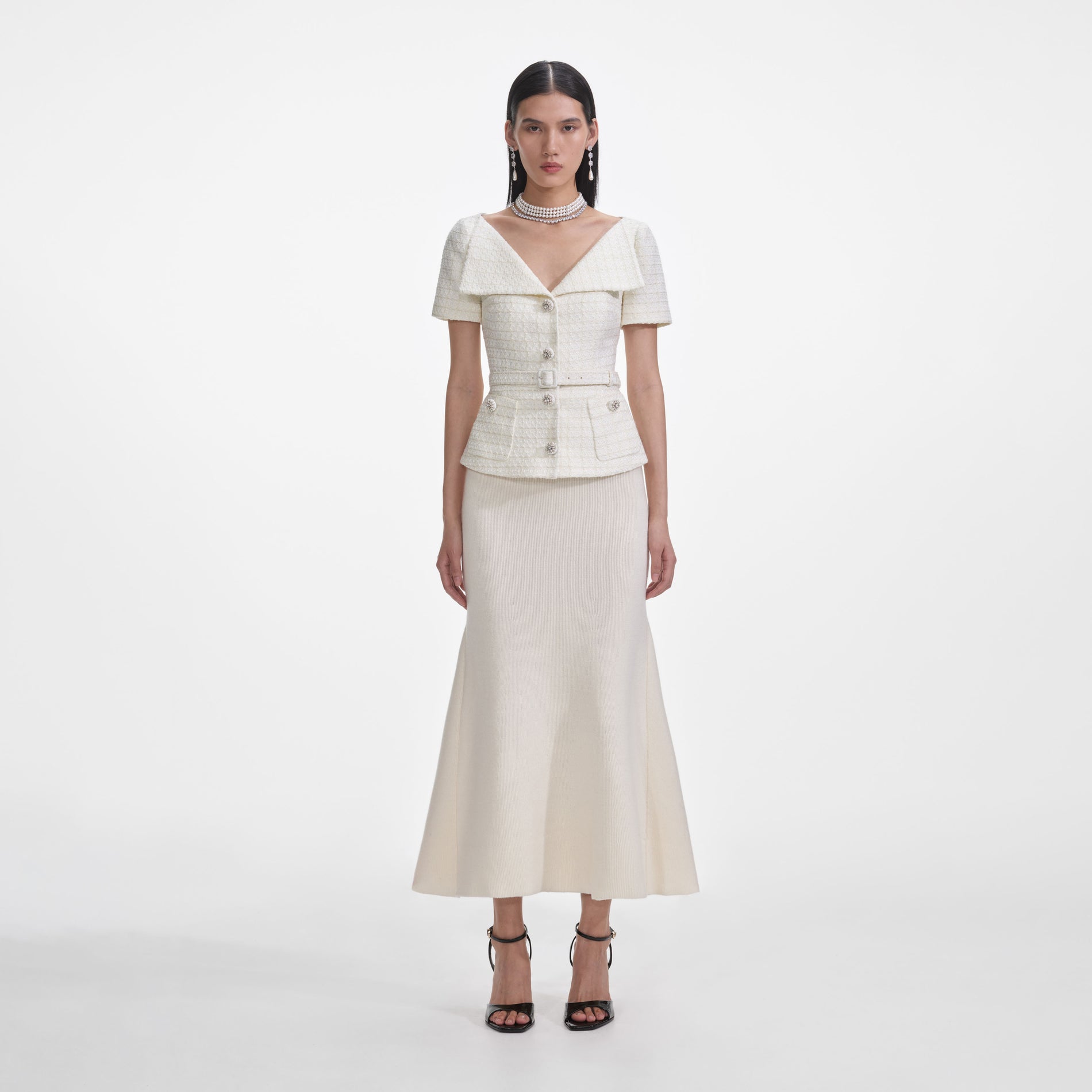 Front view of a woman wearing the Cream Boucle Top