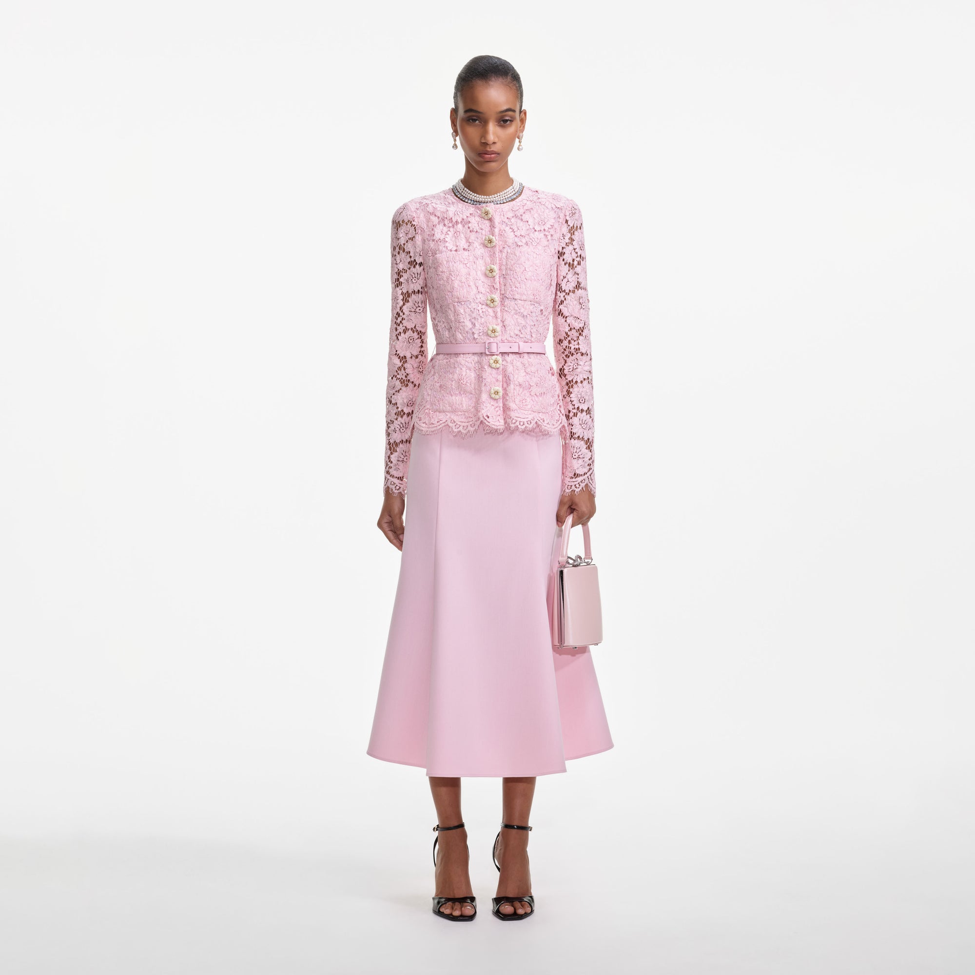 Front view of a woman wearing the Pink Tailored Lace Midi Dress