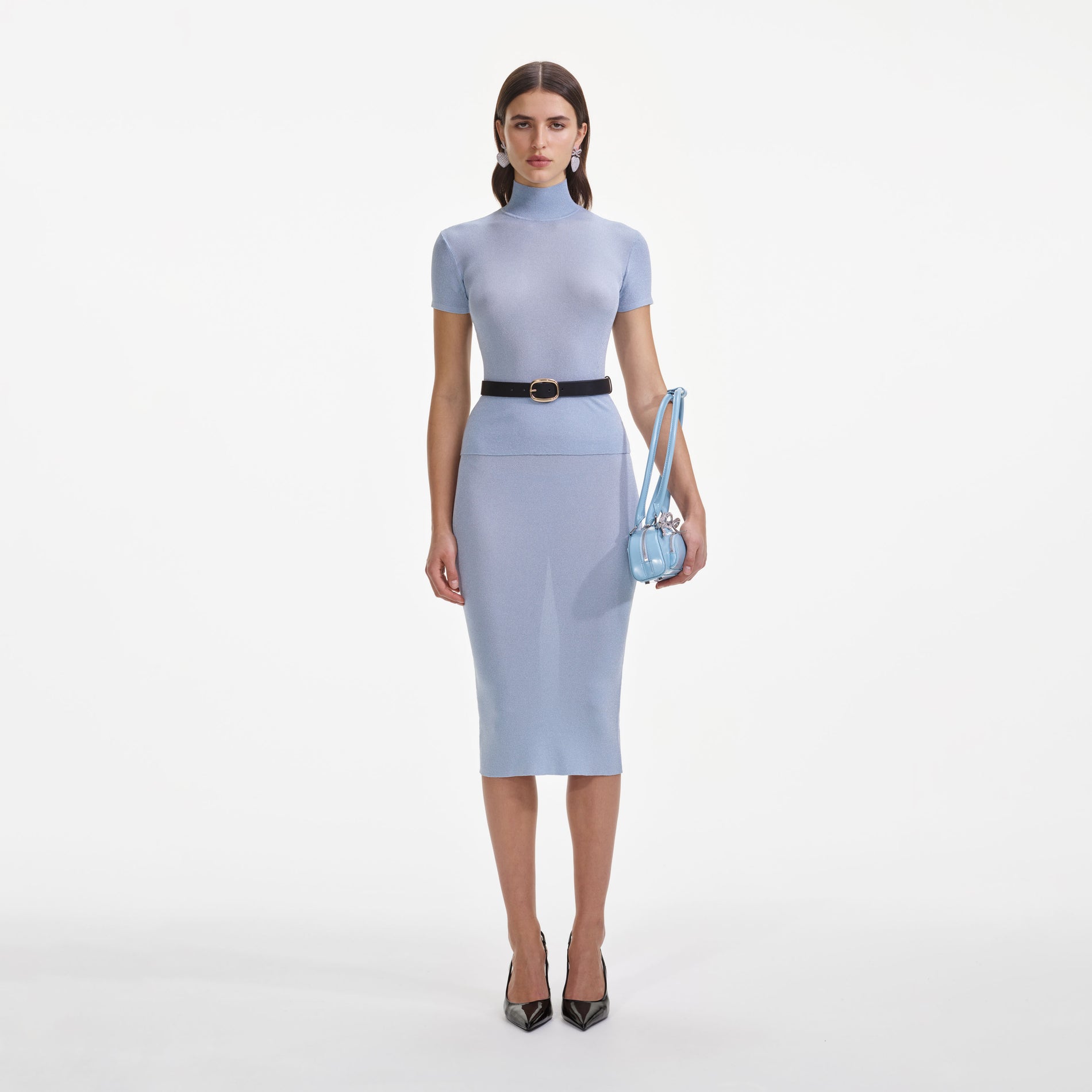Front view of a woman wearing the Blue Viscose Knit Short Sleeve Top