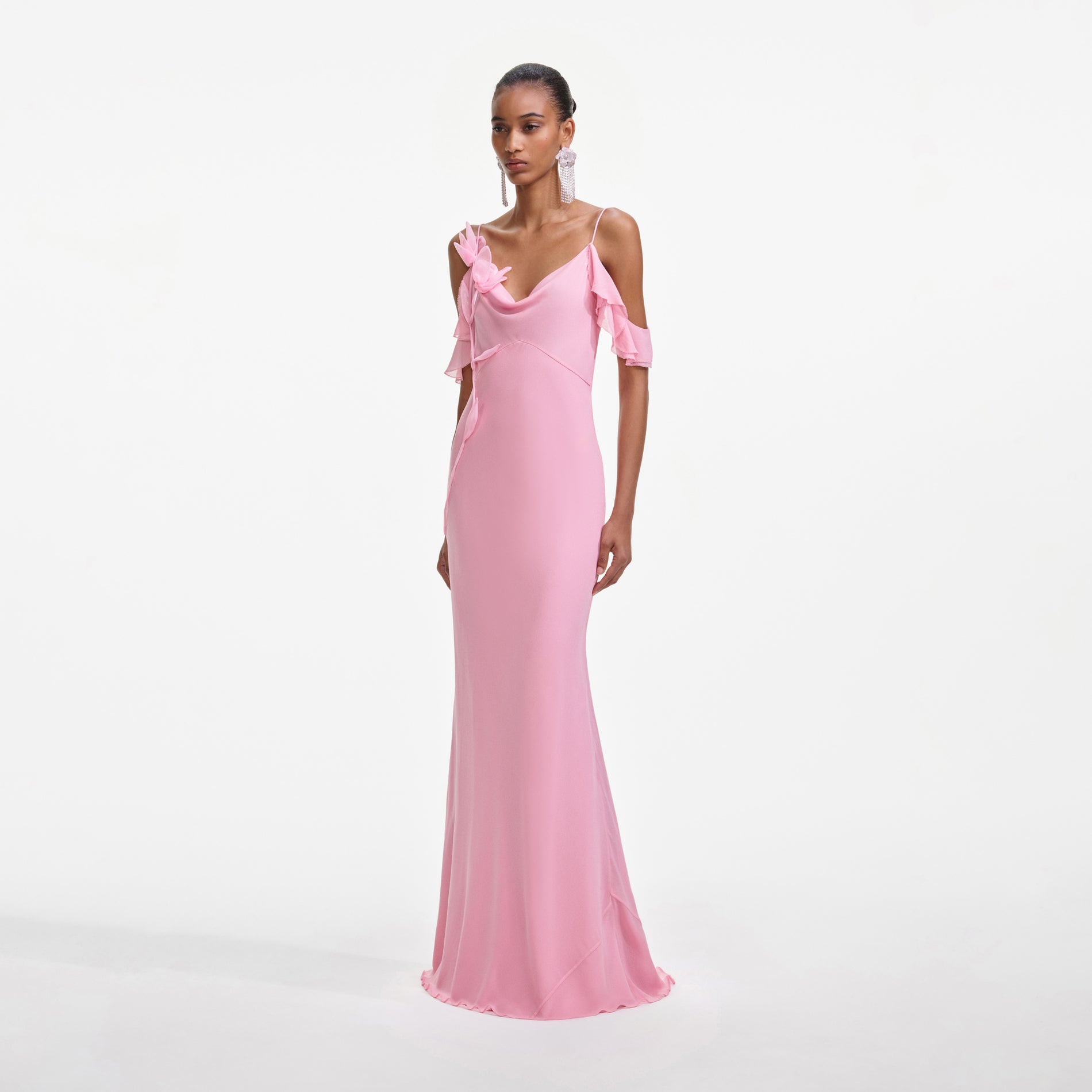Side view of a woman wearing the Pink Georgette Flower Maxi Dress