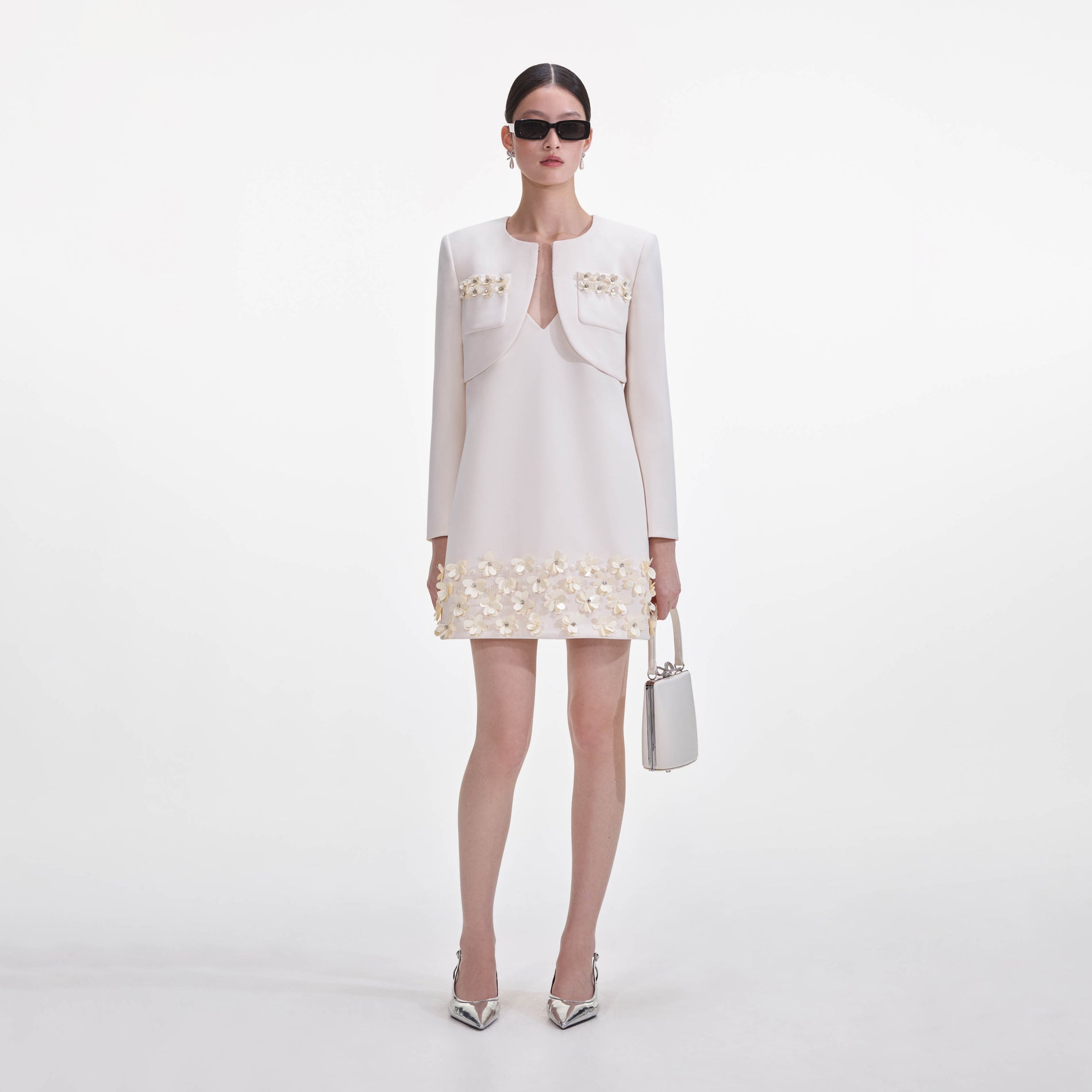 Front view of a woman wearing the Cream Crepe 3D Sequin Jacket