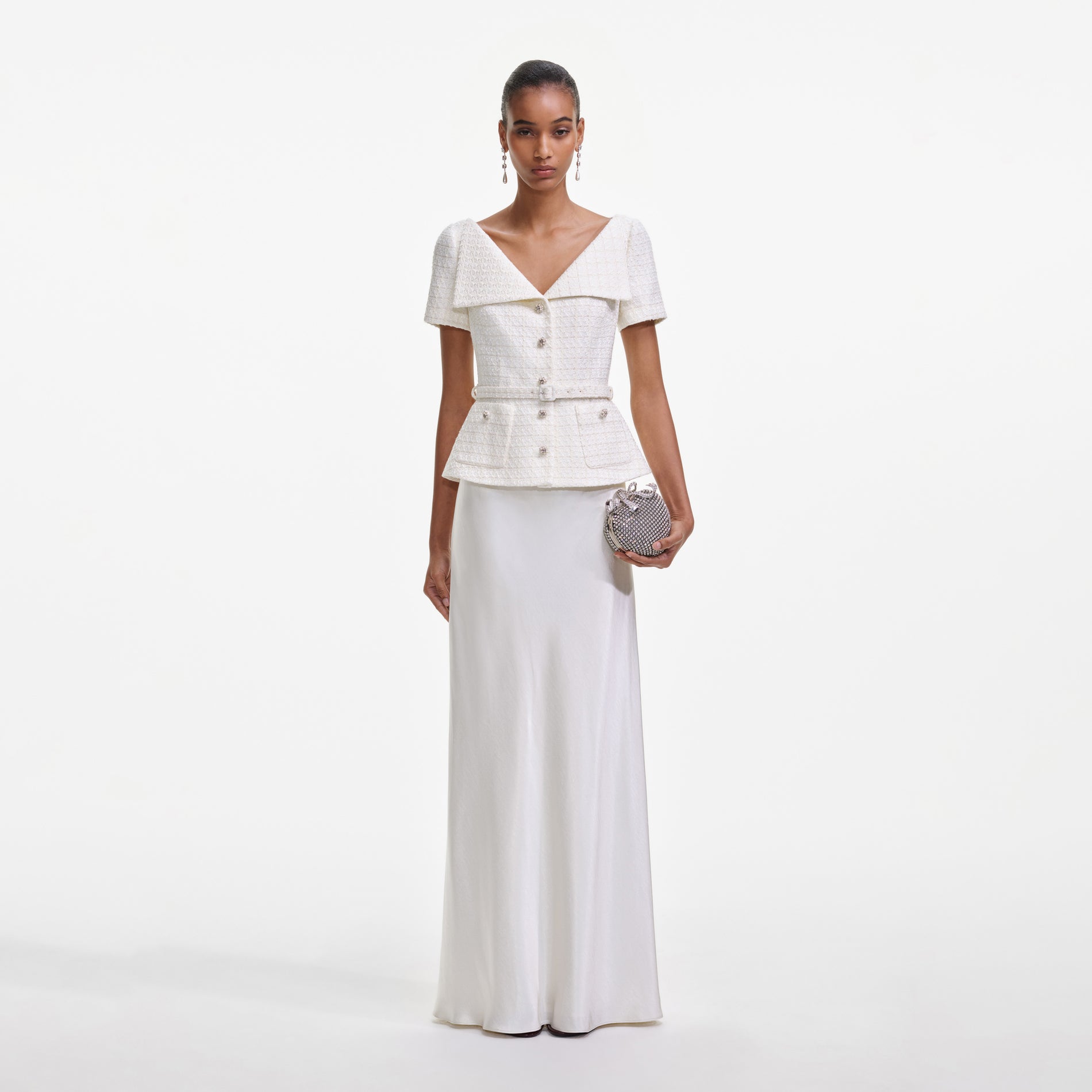 Front view of a woman wearing the Cream Boucle Tailored Maxi Dress