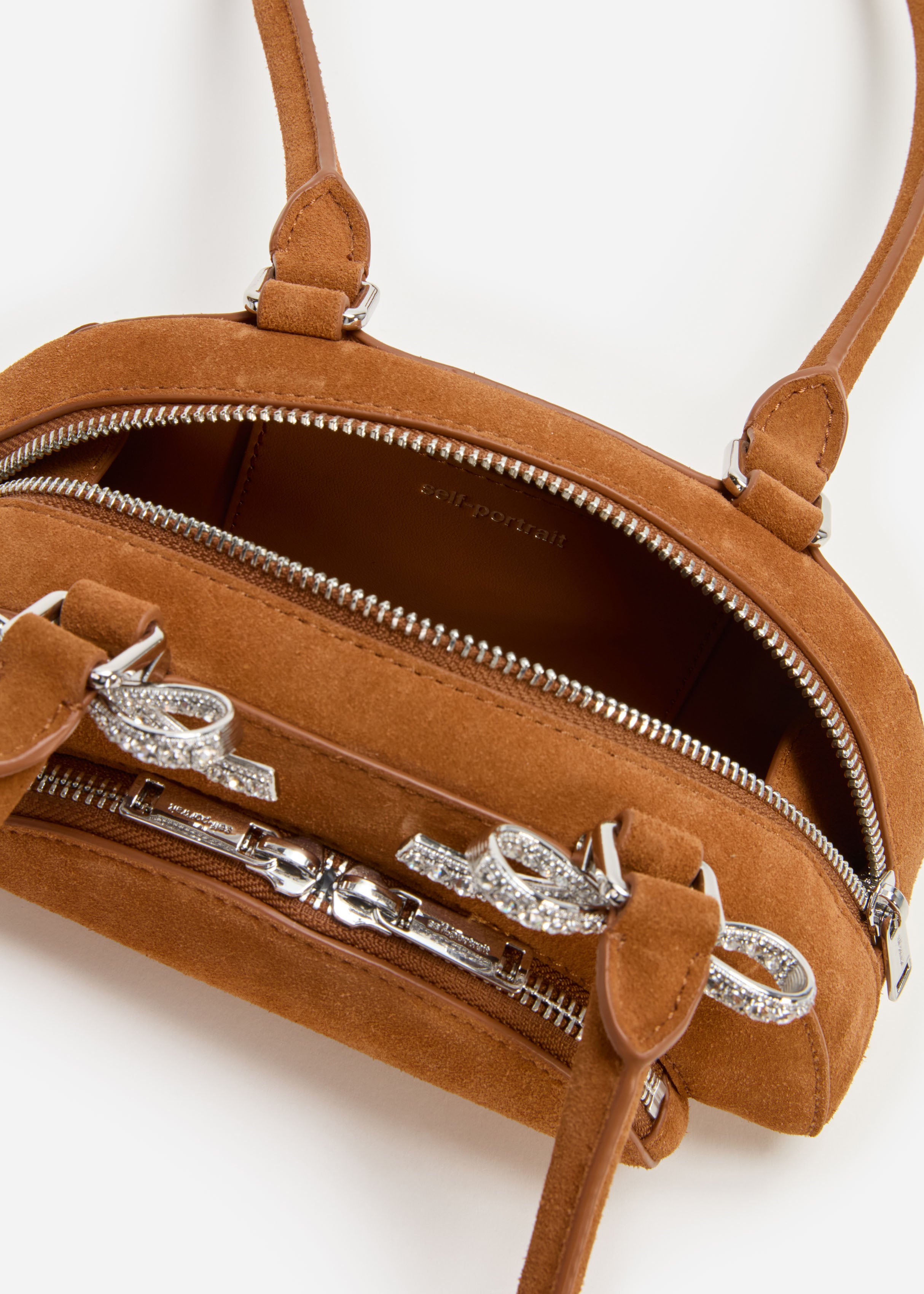 브라운 스웨이드 커브드 미니 숄더백