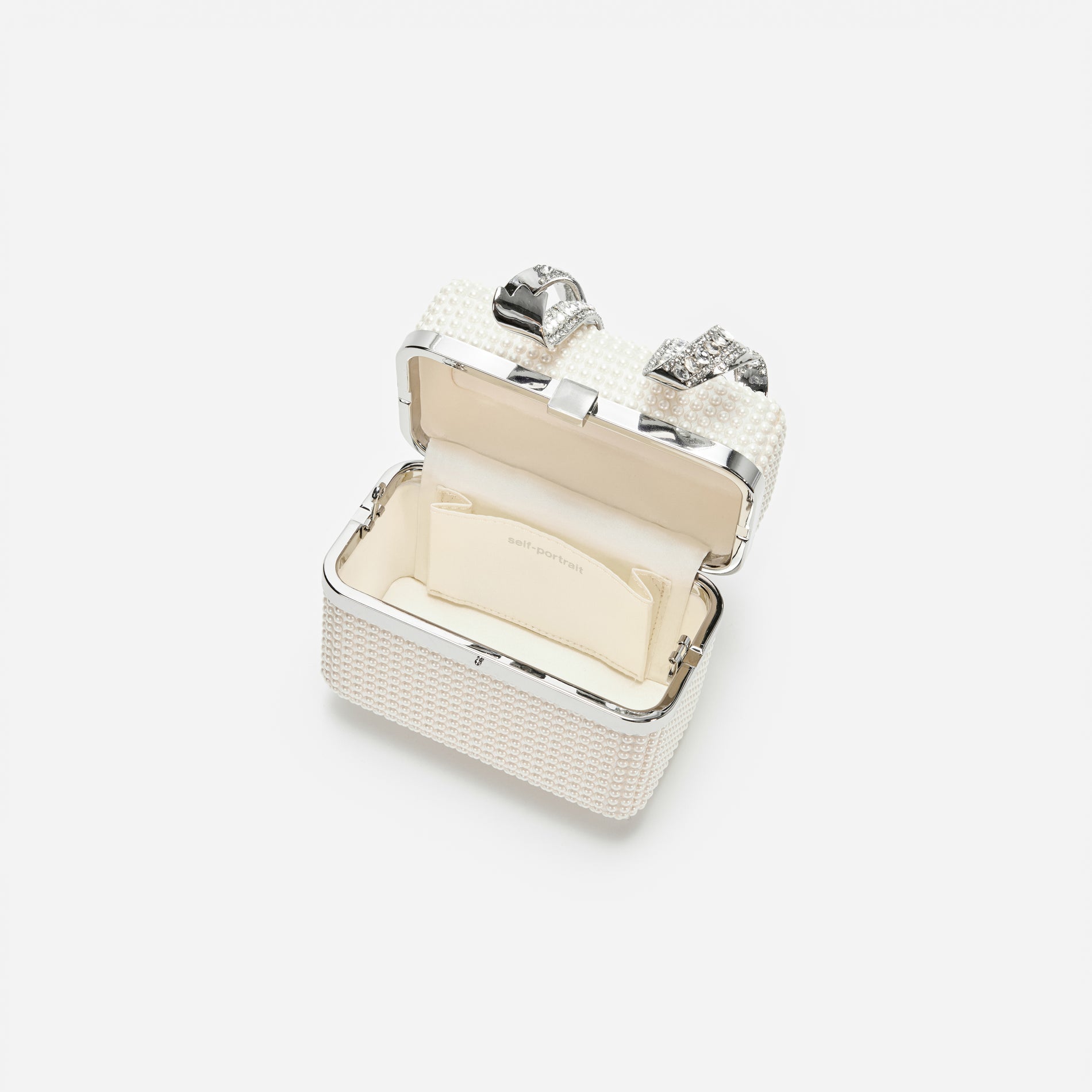 A photo of the Pearl Embellished Vanity Case