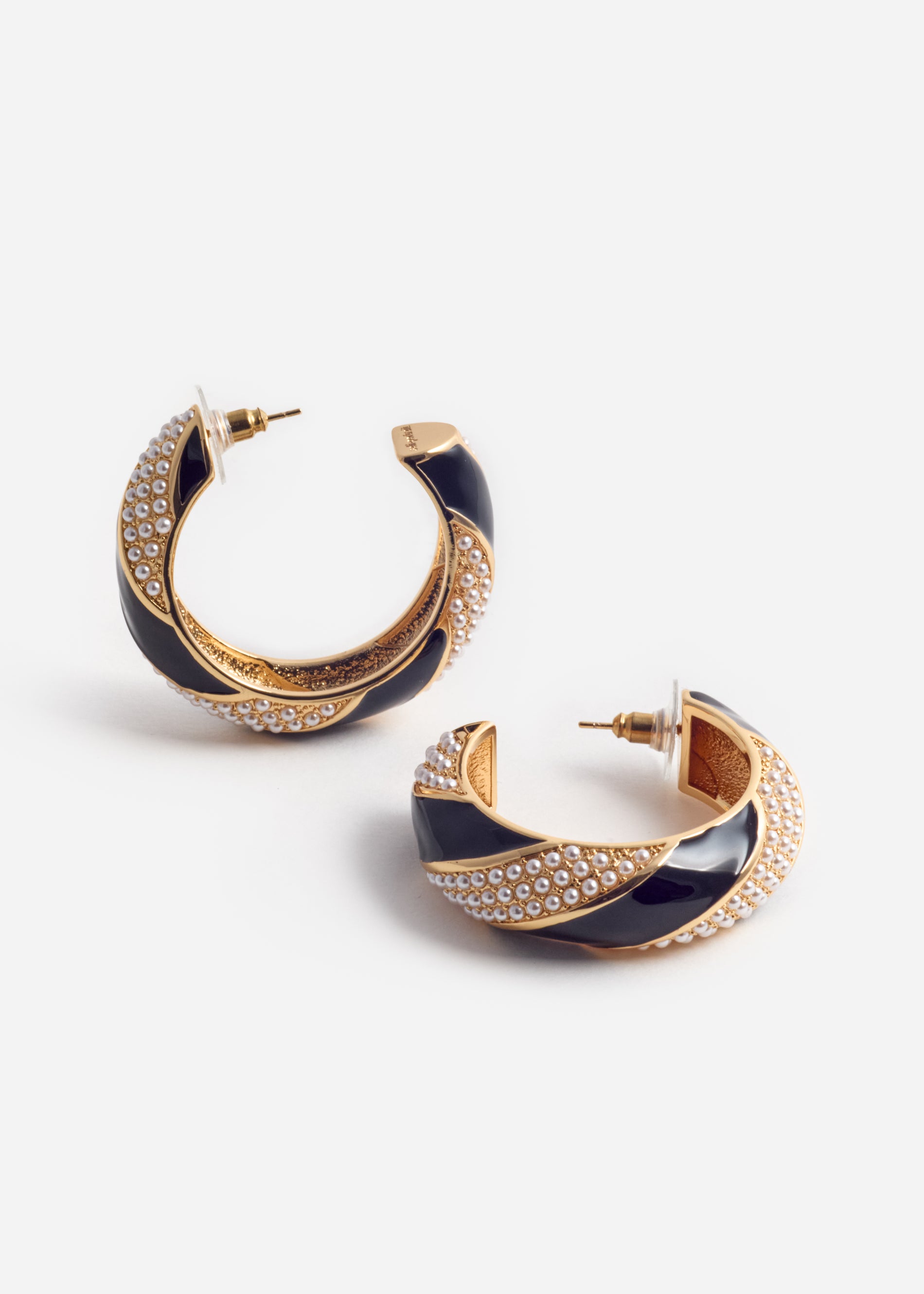 A photo of the Black And Gold Pearl Hoop Earrings