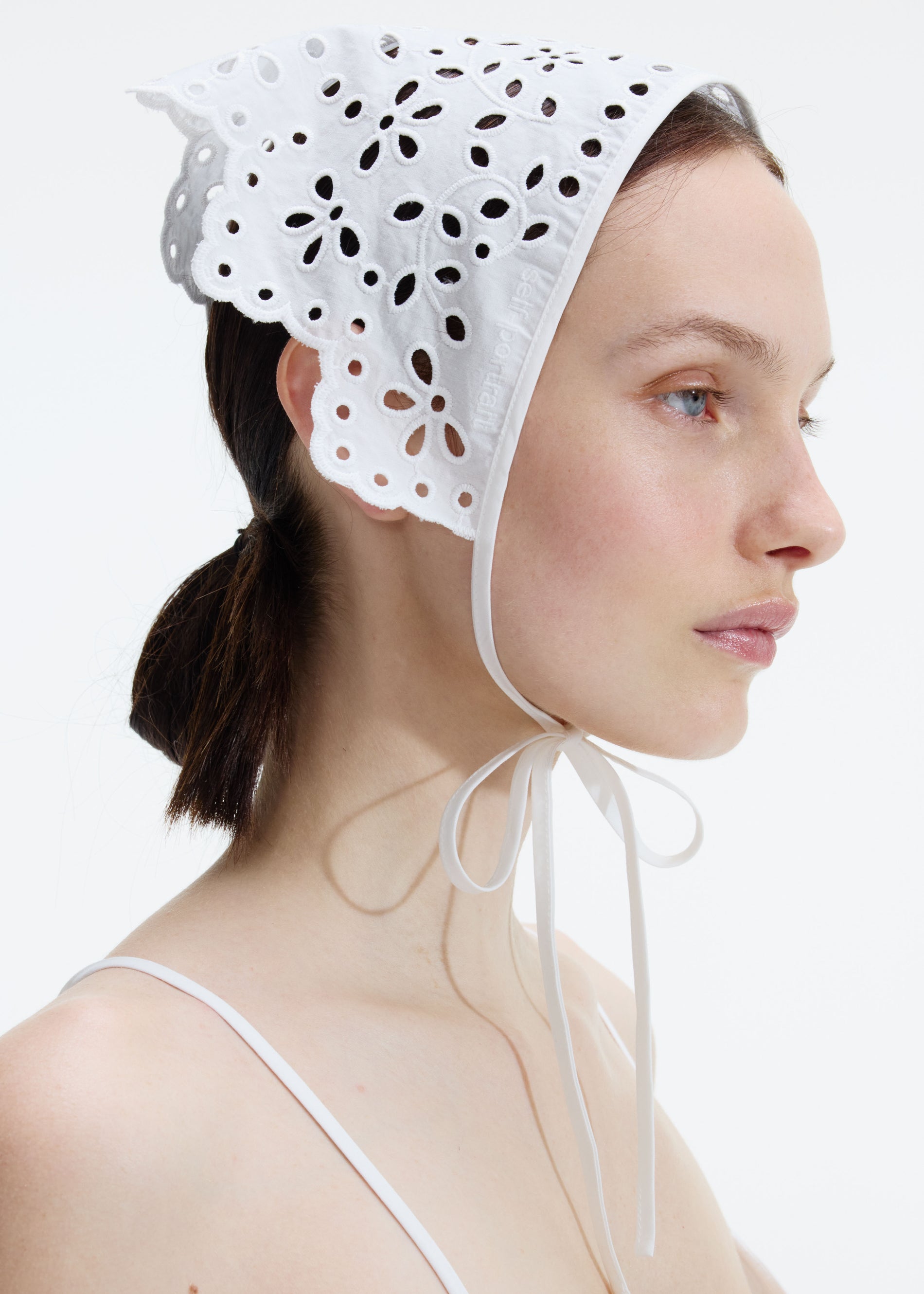 A photo of the White Cotton Embroidered Bandana