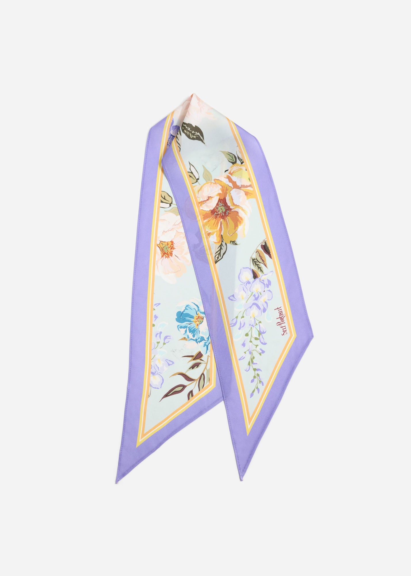 Side view of a woman wearing the Blue Floral Twill Scarf