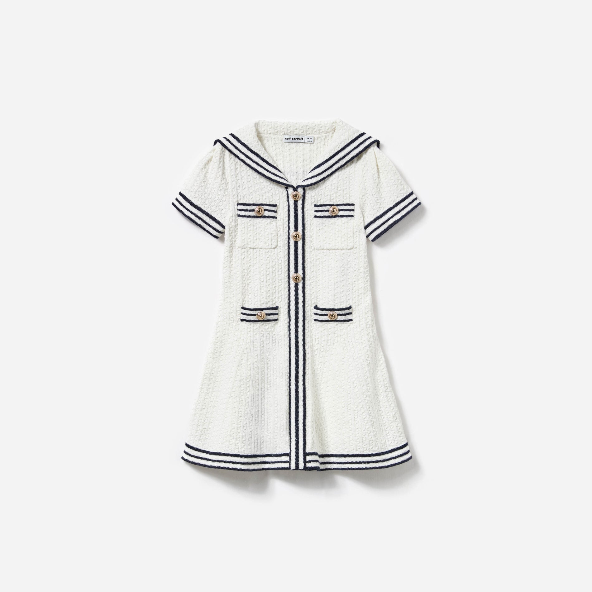 Front view of a woman wearing the Cream Textured Knit Dress