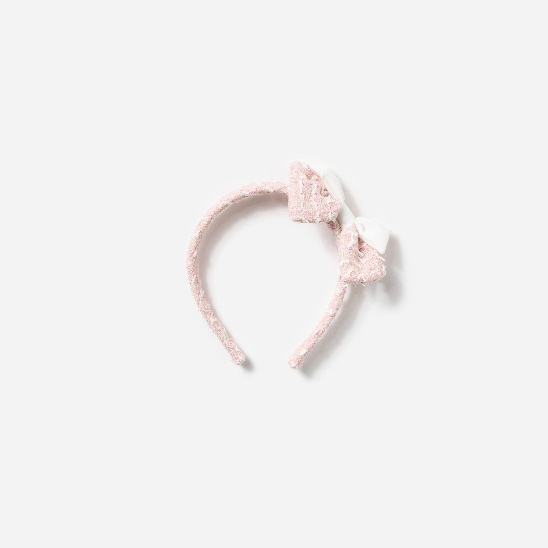 A photo of the Pink Boucle Bow Headband