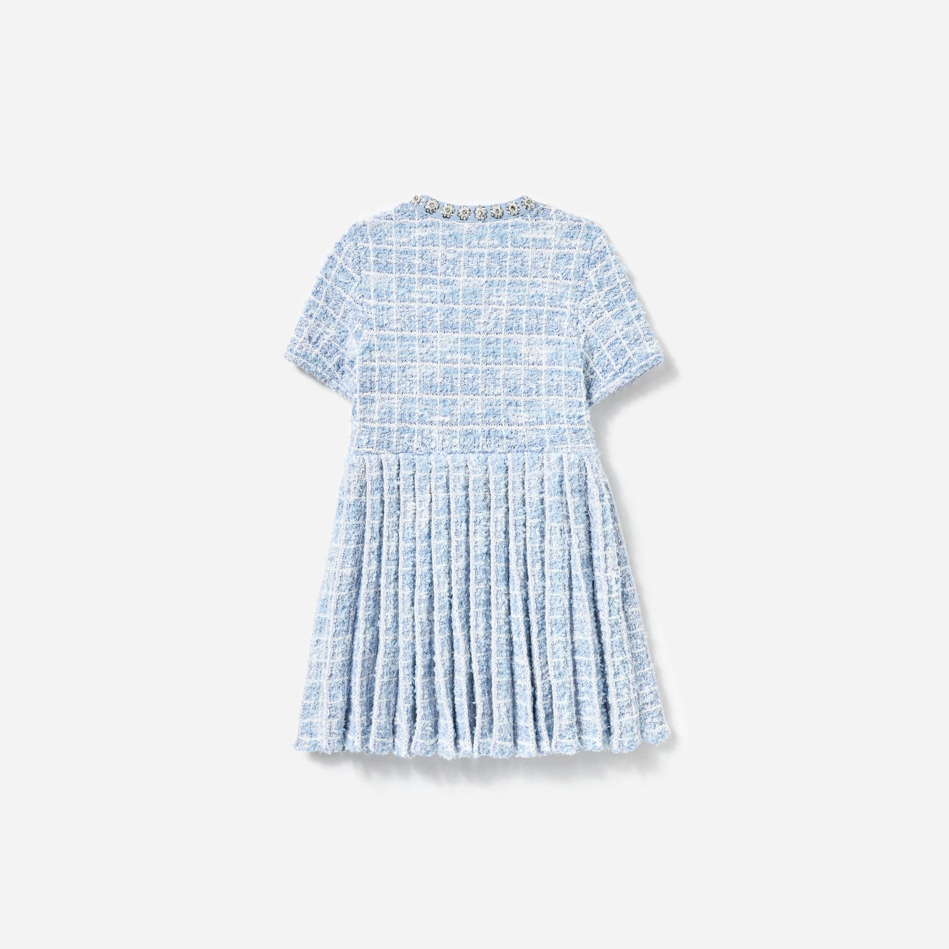 Side view of a woman wearing the Blue Check Knit Dress