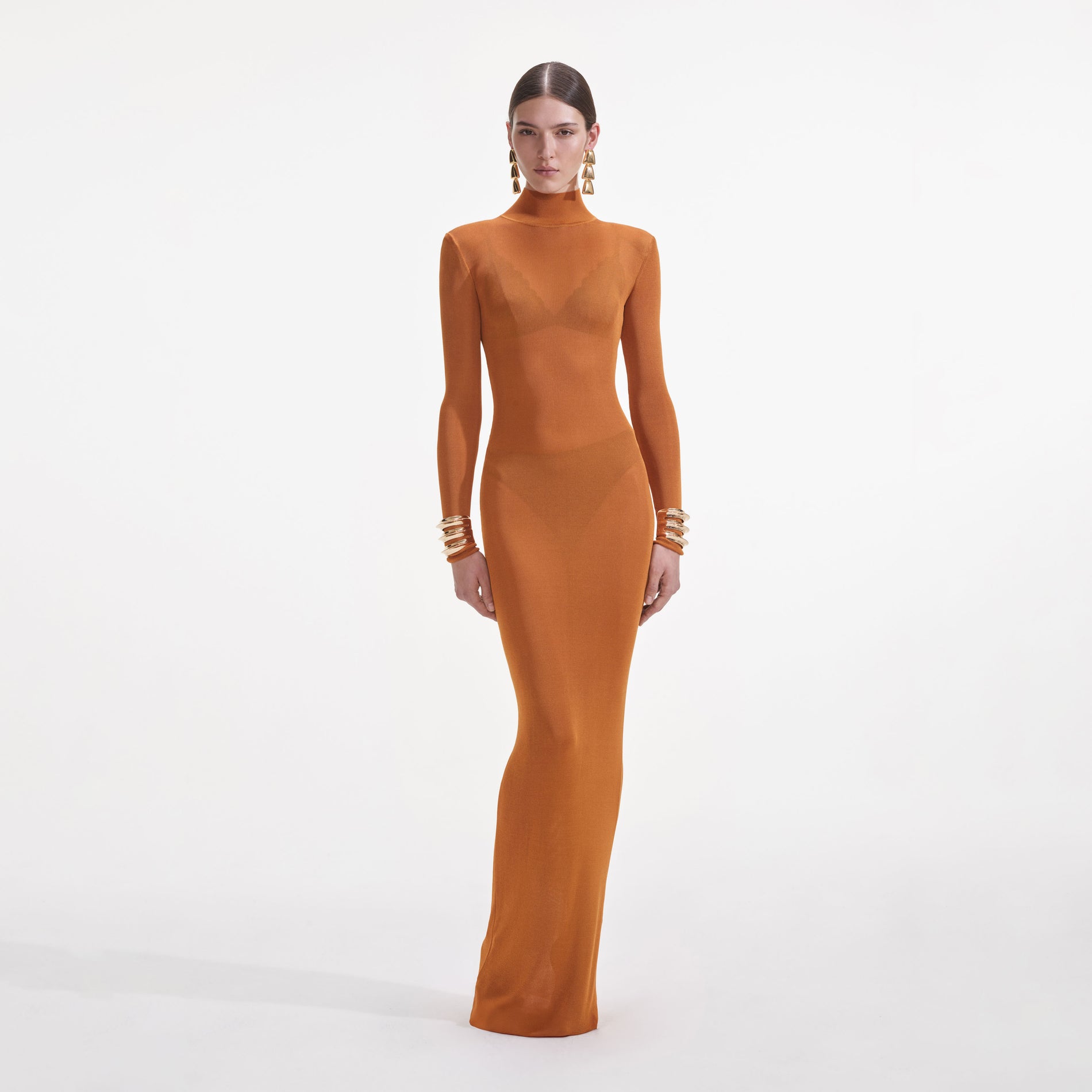 Front view of a woman wearing the Tan Viscose Knit Maxi Dress