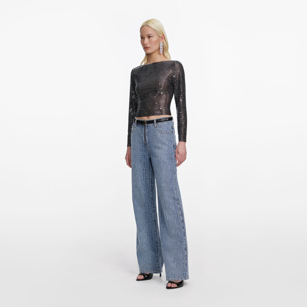 Side view of a woman wearing the Croc Effect Straight Leg Jeans