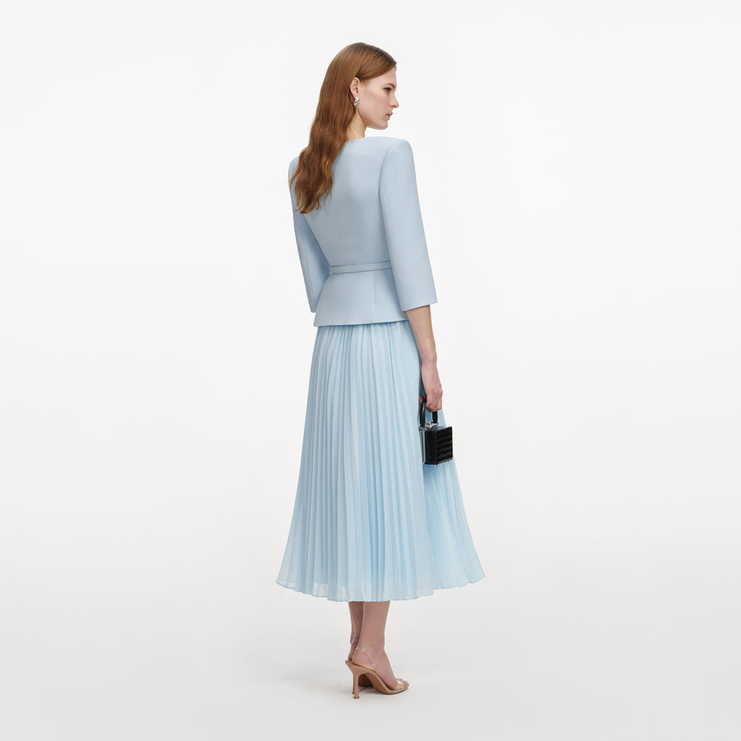 Back view of a woman wearing the Blue 3D Flower Chiffon Midi Dress