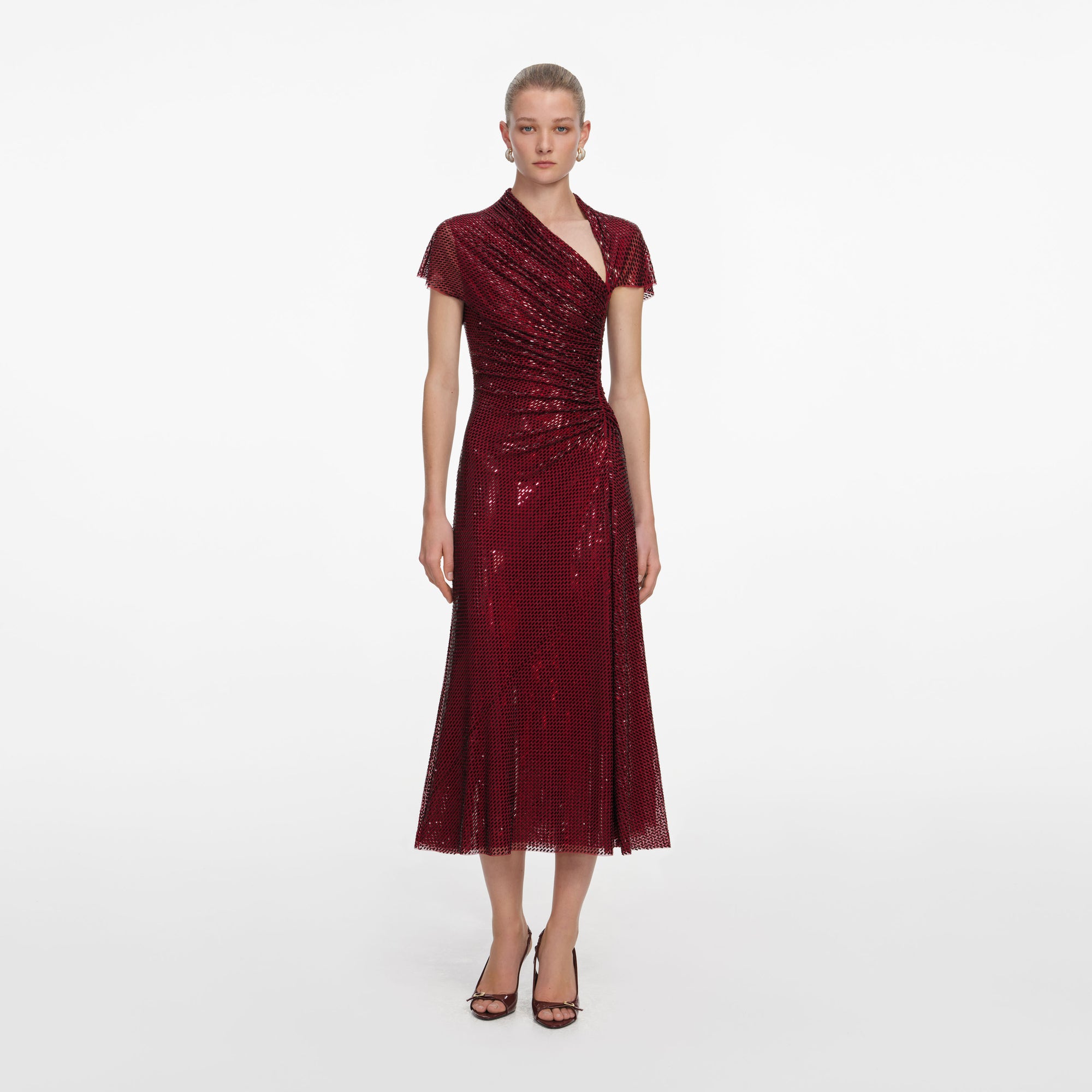 Front view of a woman wearing the Red Rhinestone Drape Midi Dress