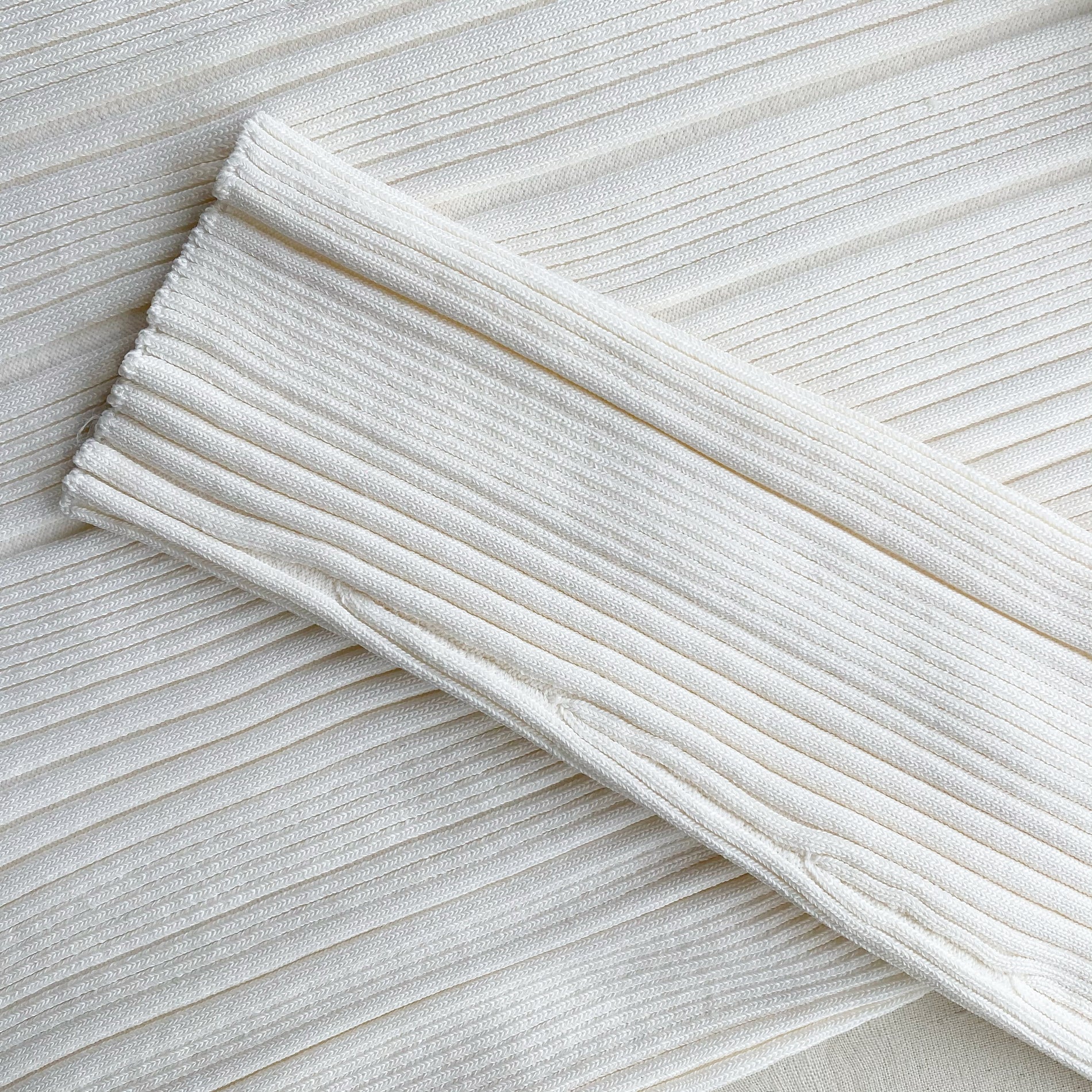 A close up of the fabric for the Ivory Contrast Stitch Knit Dress