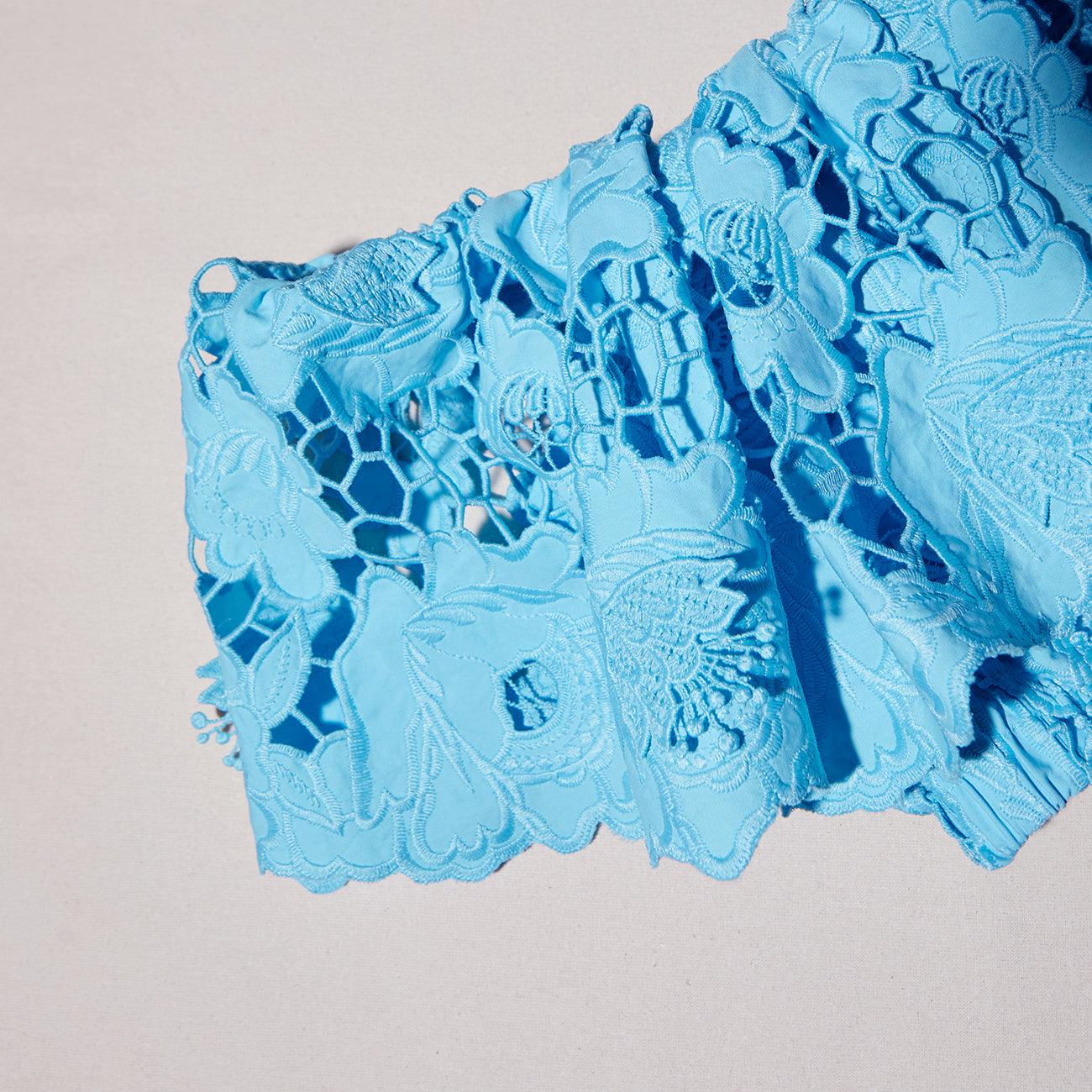 A close up of the fabric for the Blue Lace Top