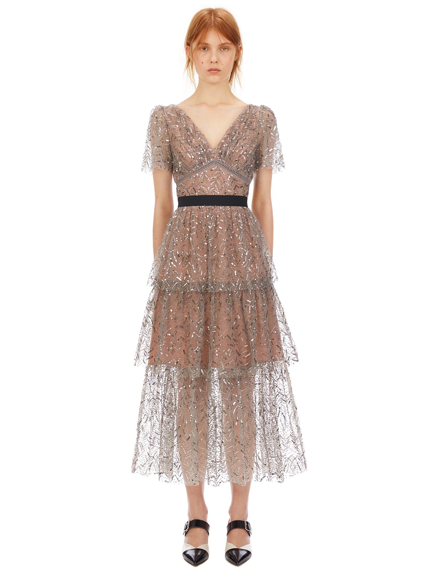 A woman wearing the Leaf Sequin Midi Dress