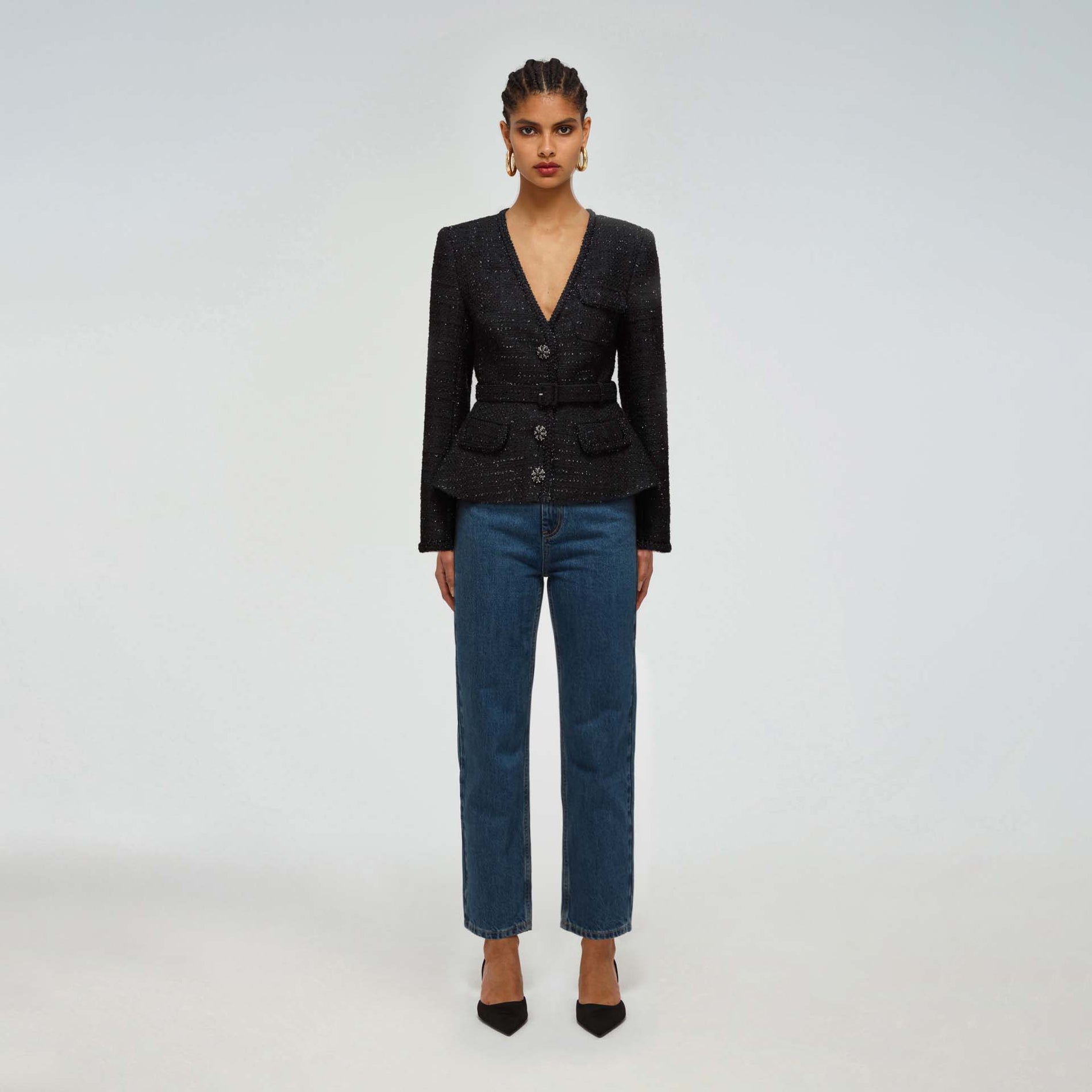 A woman wearing the Metallic Boucle Tailored Jacket