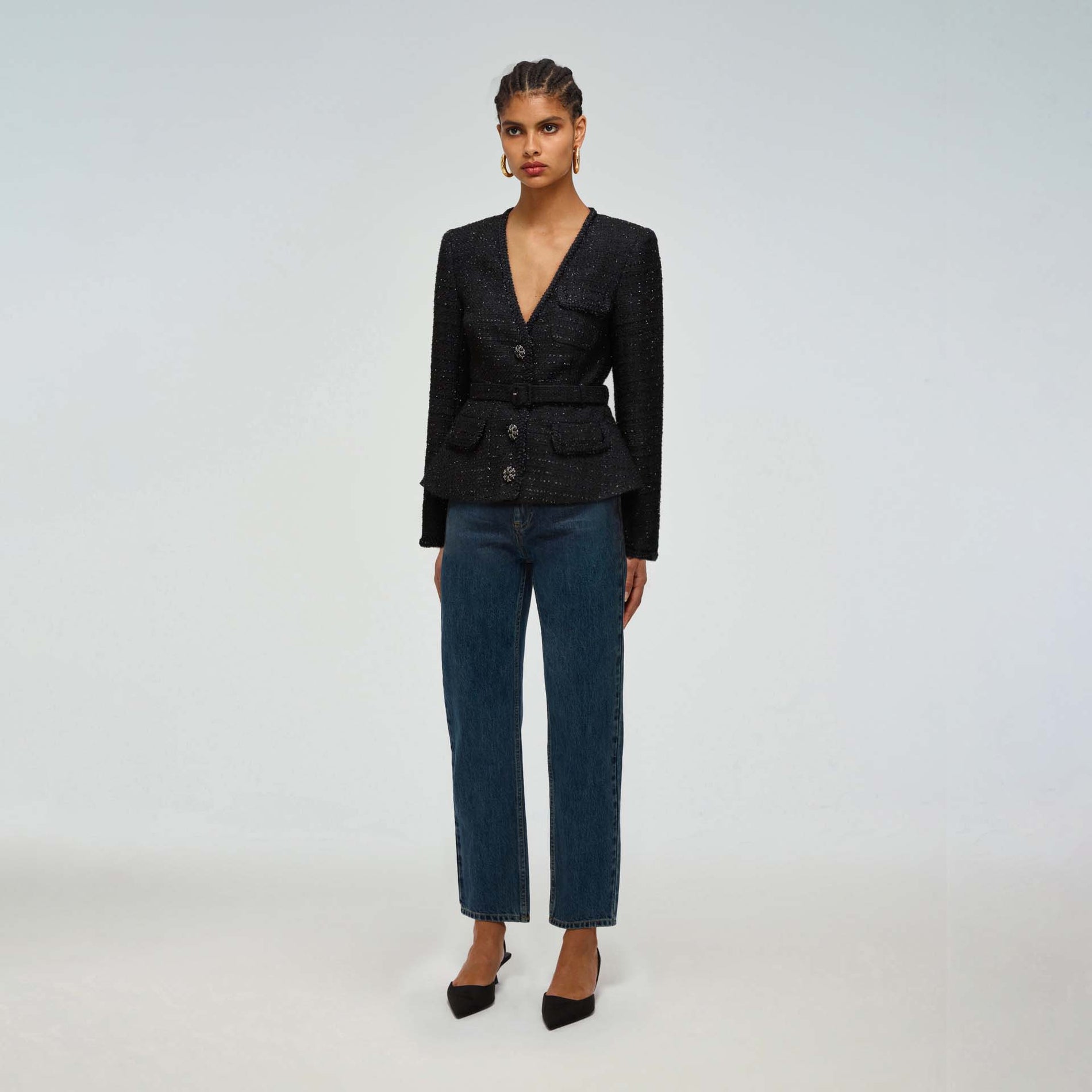 A woman wearing the Metallic Boucle Tailored Jacket