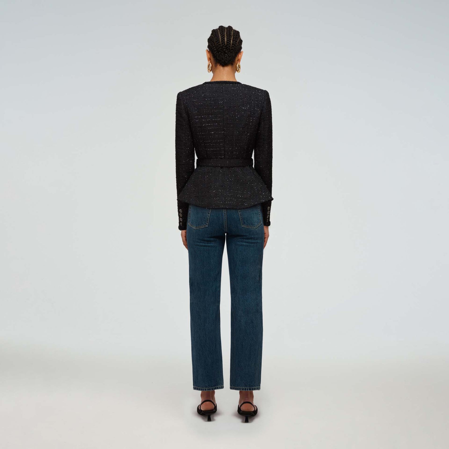 A woman wearing the Metallic Boucle Tailored Jacket