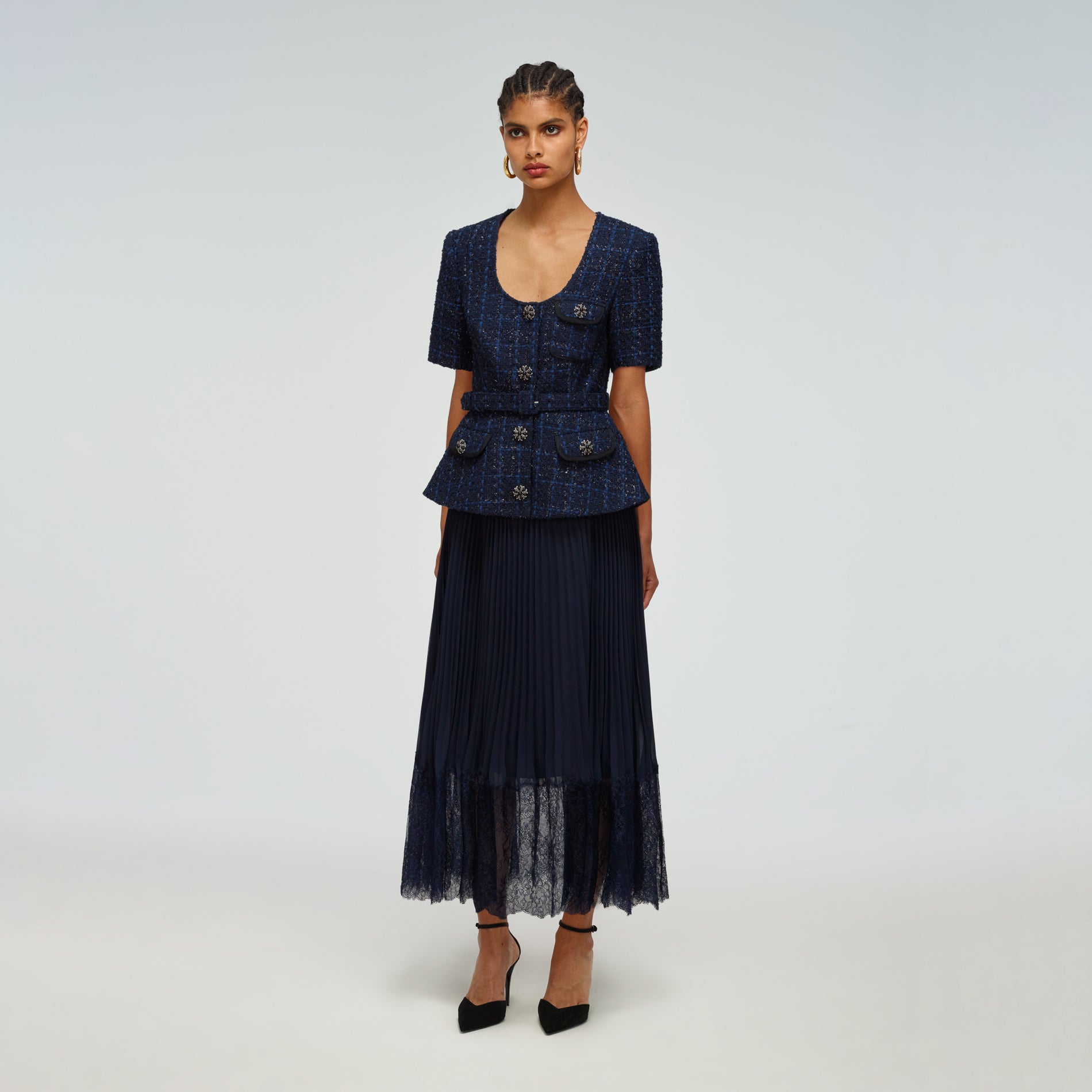 A woman wearing the Navy Metallic Bouclé Tailored Midi Dress