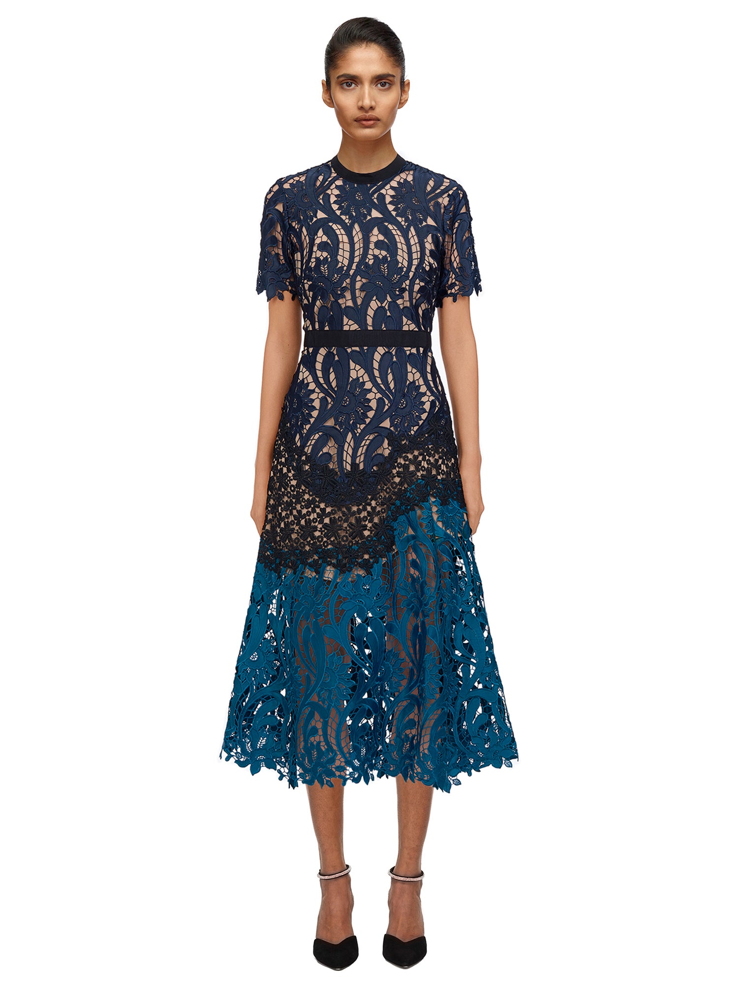 Front view of a woman wearing the Prairie Midi Dress
