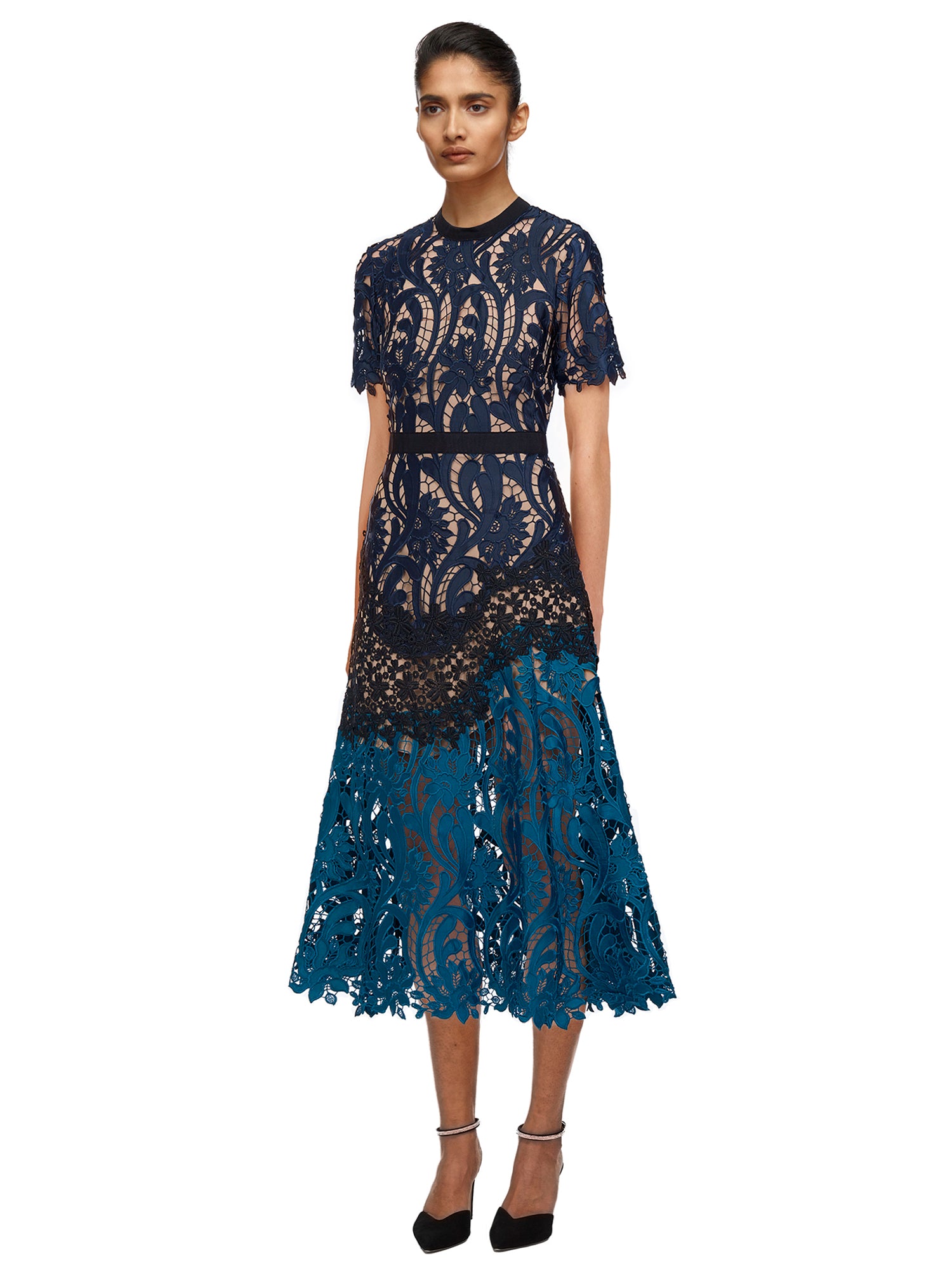Side view of a woman wearing the Prairie Midi Dress