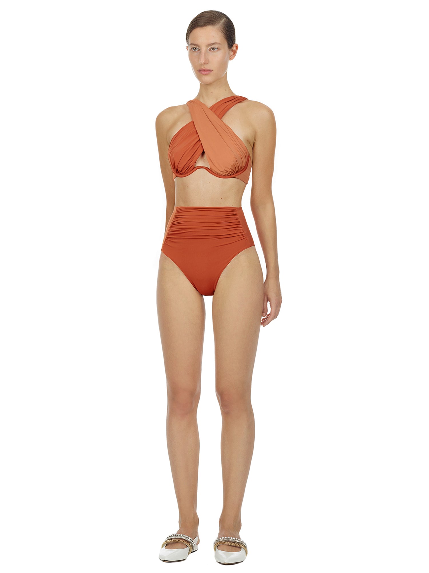 Side view of a woman wearing the Pink High Waisted Bikini Briefs Pink