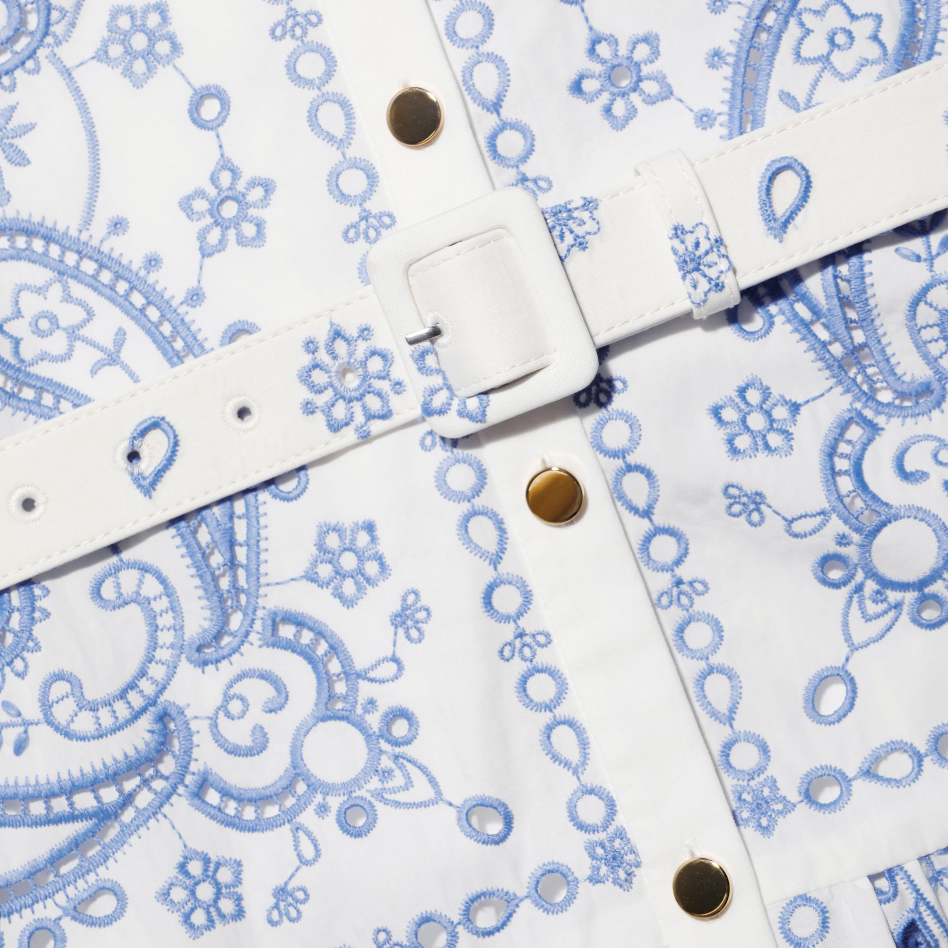 A close up of the fabric for the White And Blue Embroidered Midi Dress