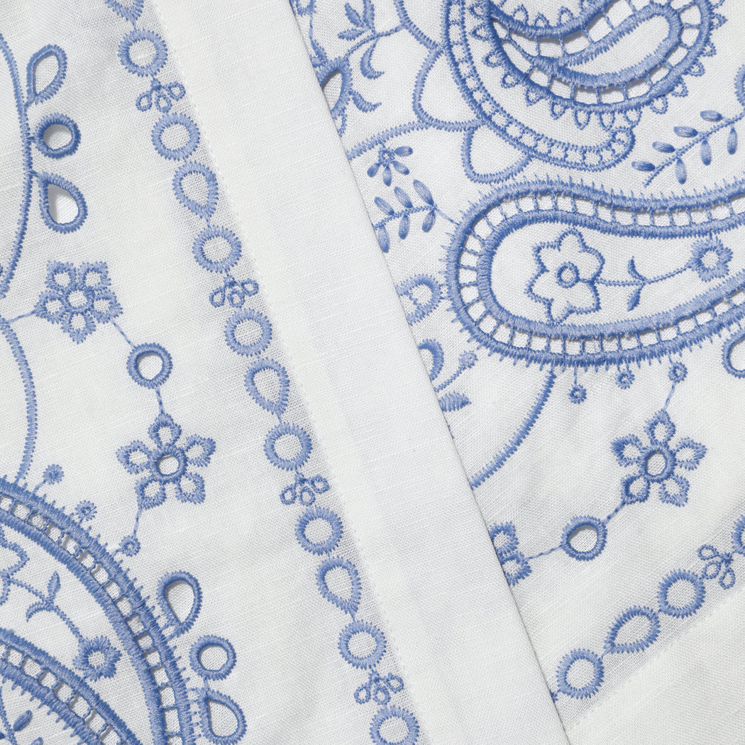 A close up of the fabric for the White And Blue Embroidered Linen Skort