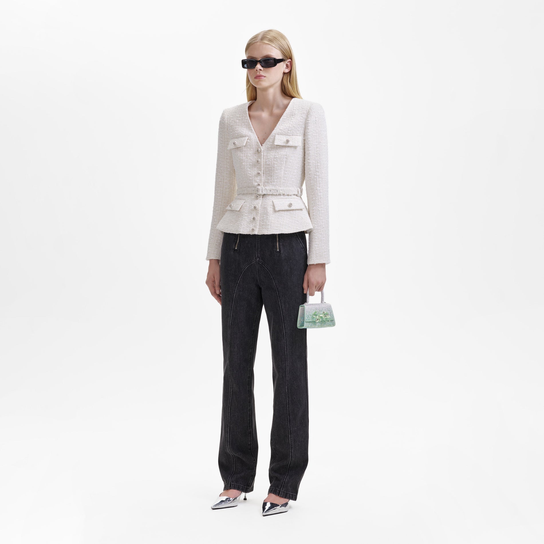 A woman wearing the Cream Boucle Tailored Jacket