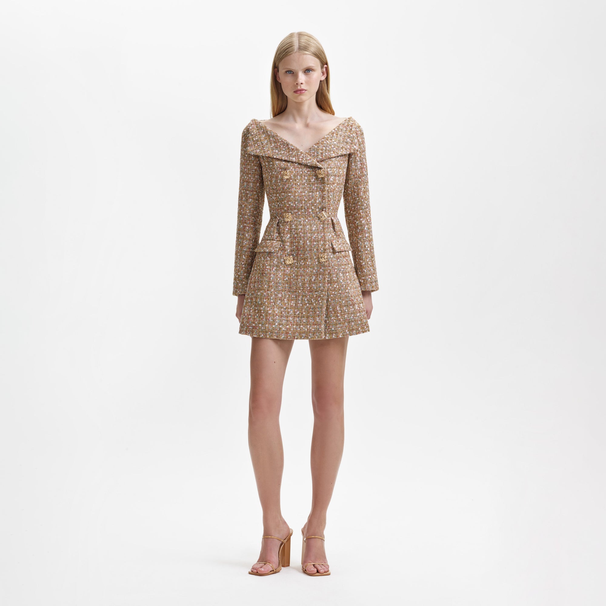 Front view of a woman wearing the Gold Tinsel Boucle Off Shoulder Mini Dress