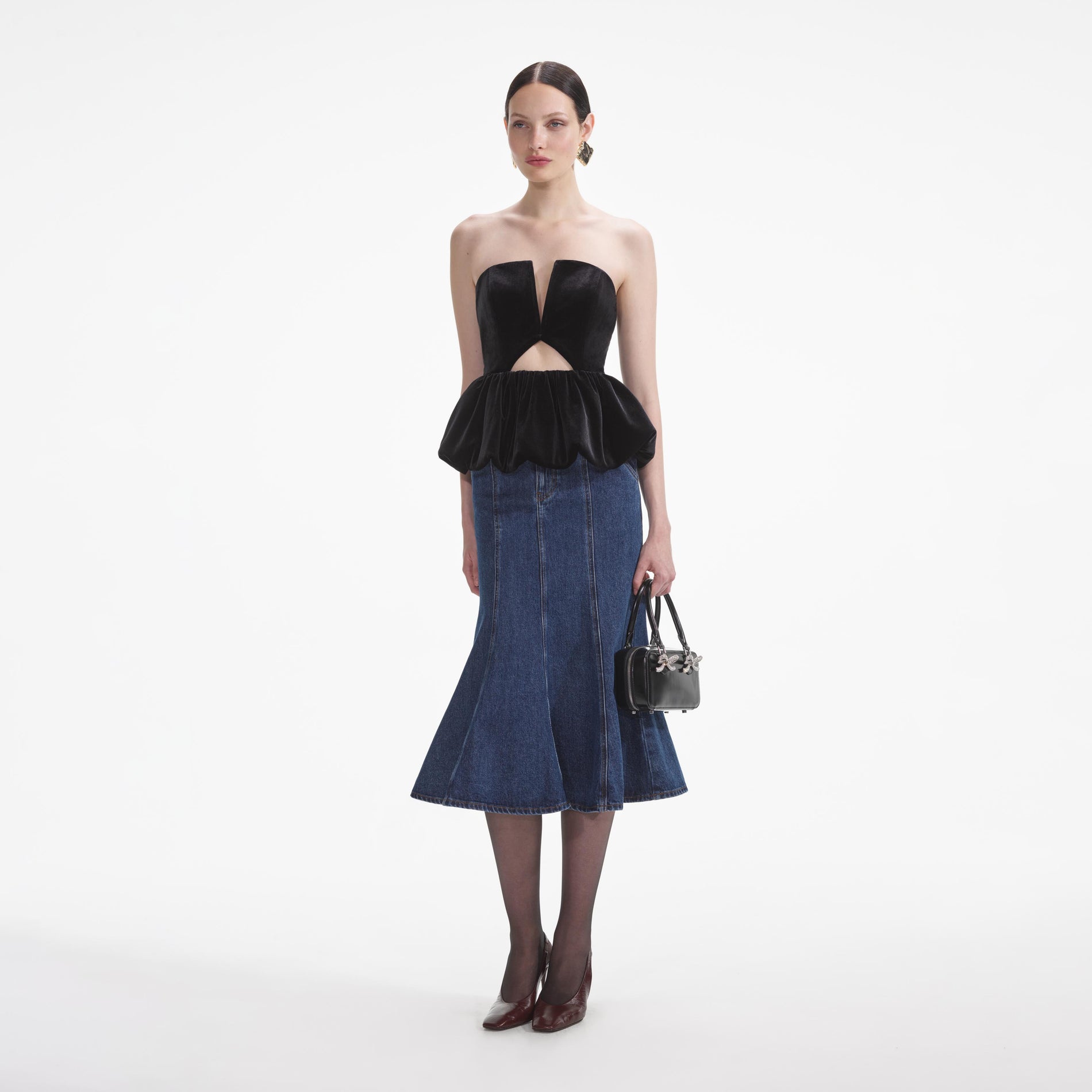 Side view of a woman wearing the Black Velvet Bandeau Top