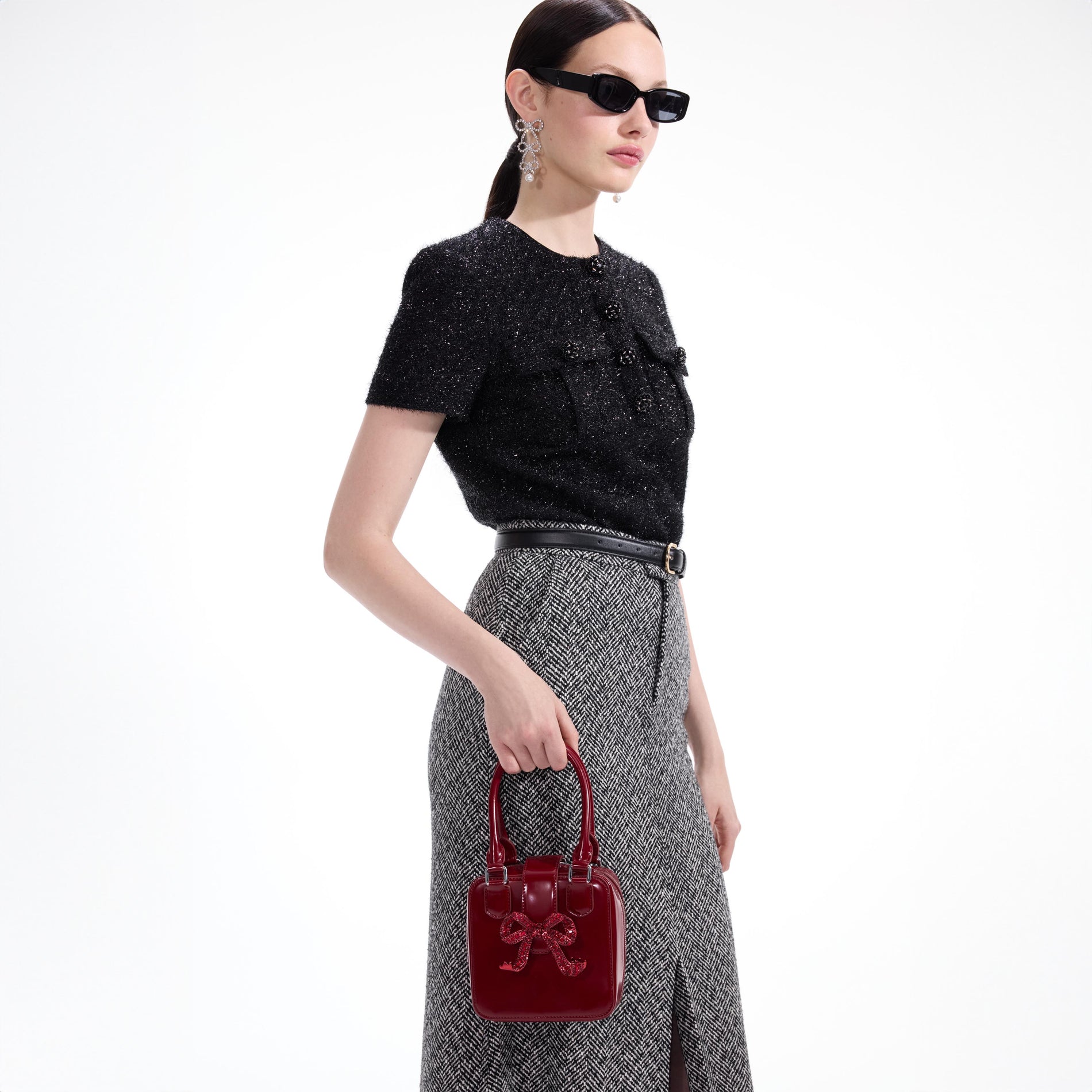 A close up of the fabric for the Burgundy Leather Square Mini Tote Bag