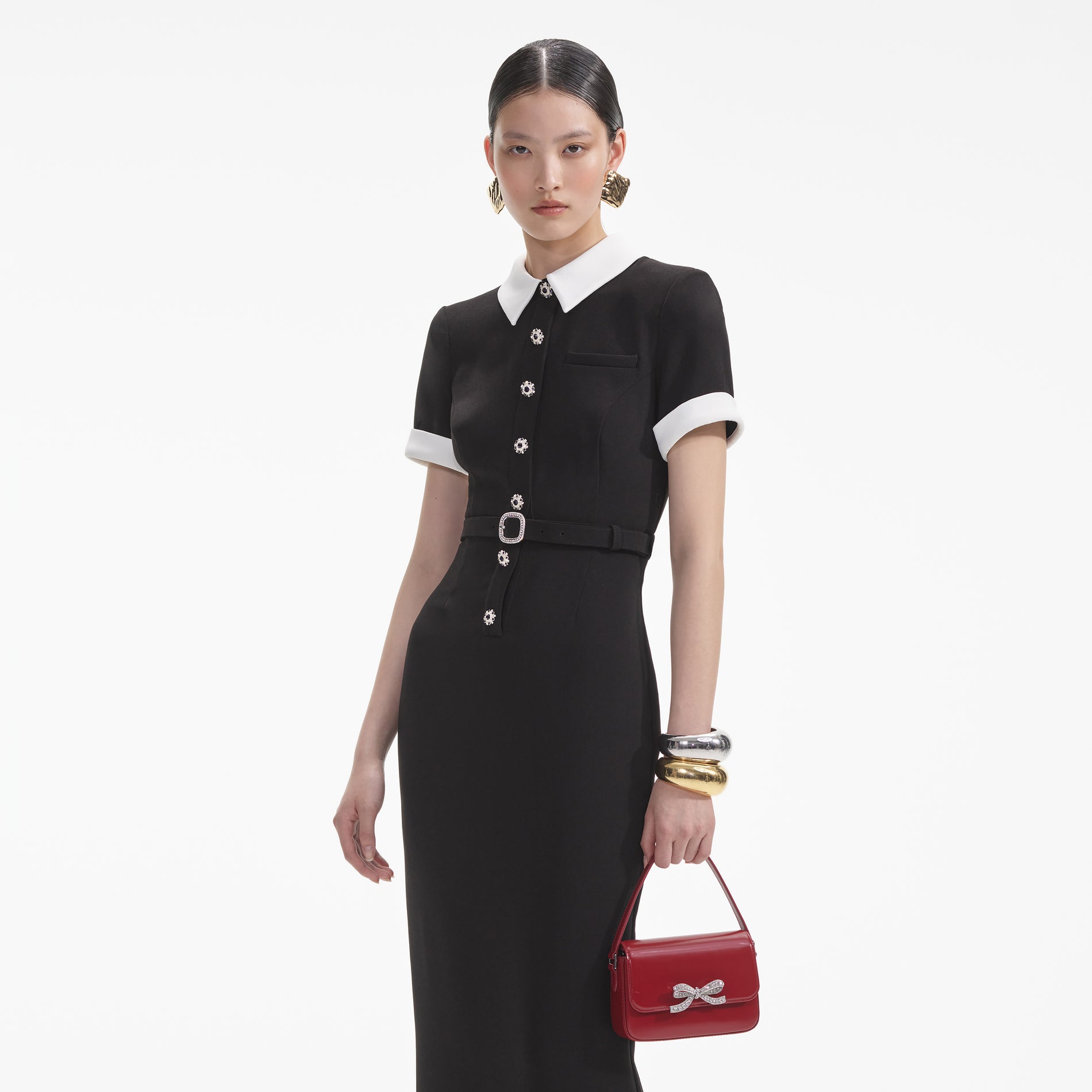 Back view of a woman wearing the White Silver Chunky Cuff