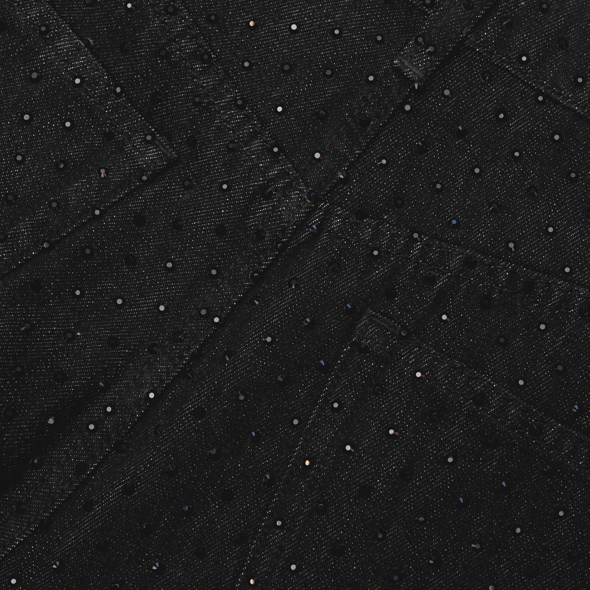 A close up of the fabric for the Black Rhinestone Jeans