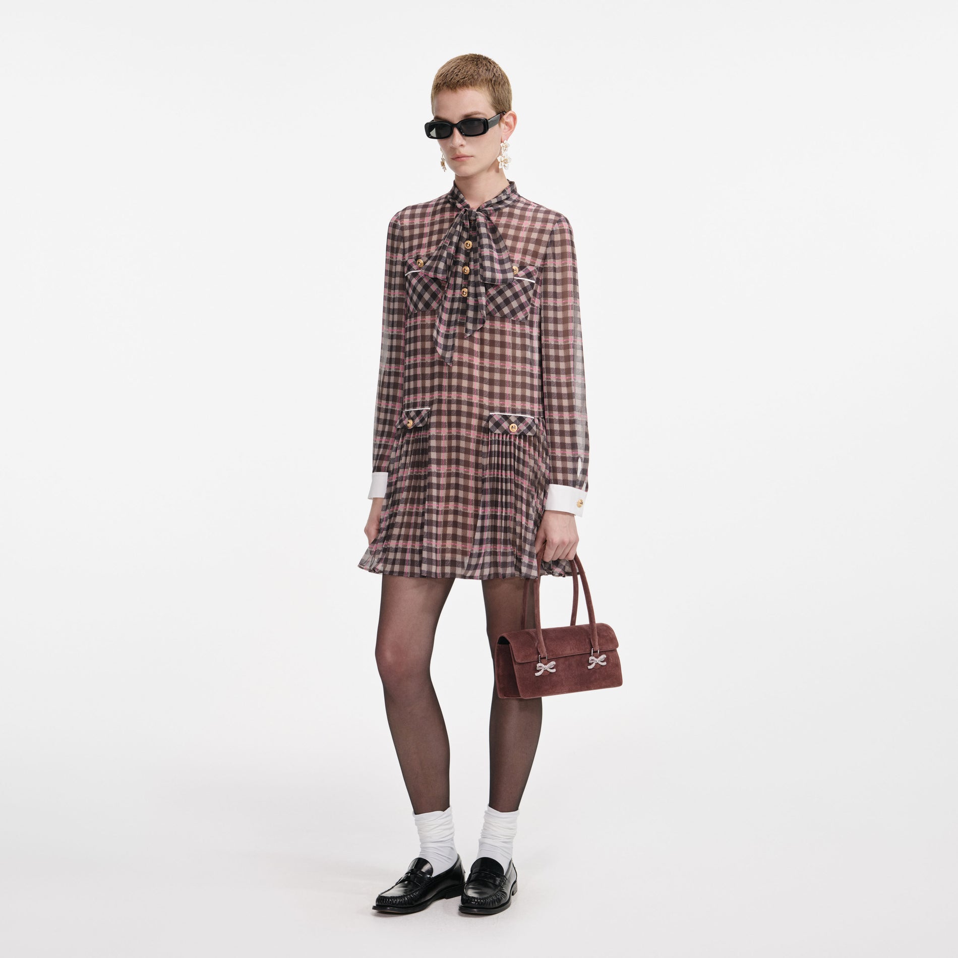 Side view of a woman wearing the Brown Check Chiffon Mini Dress