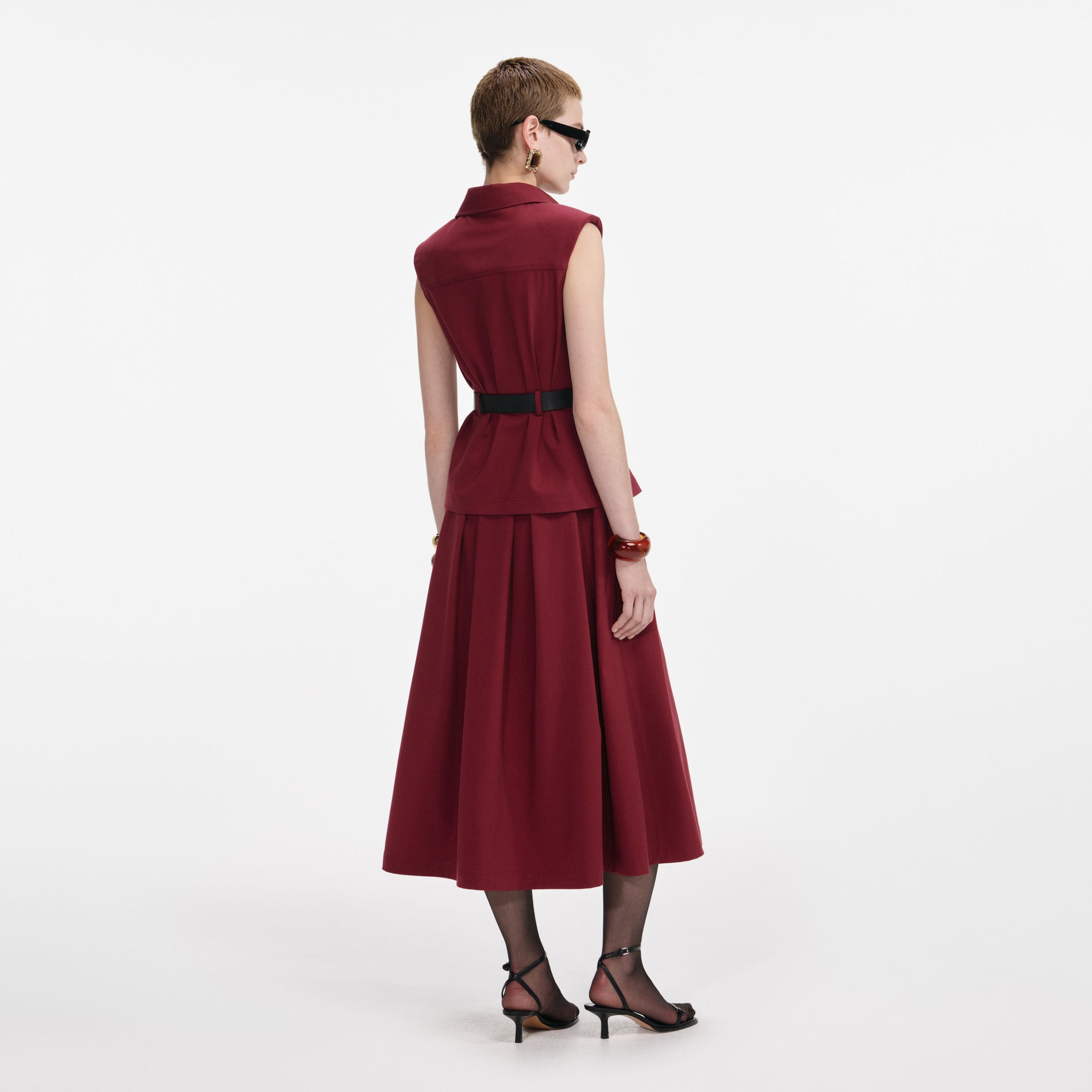 Back view of a woman wearing the Burgundy Twill Belted Midi Dress