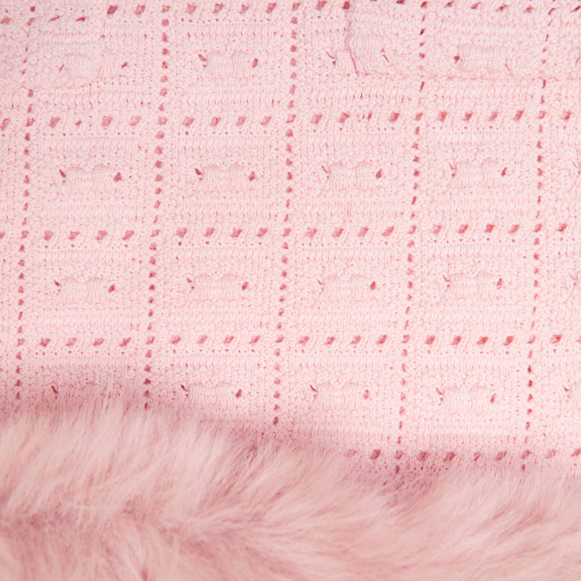 A close up of the fabric for the Pink Fur Hem Knit Skirt