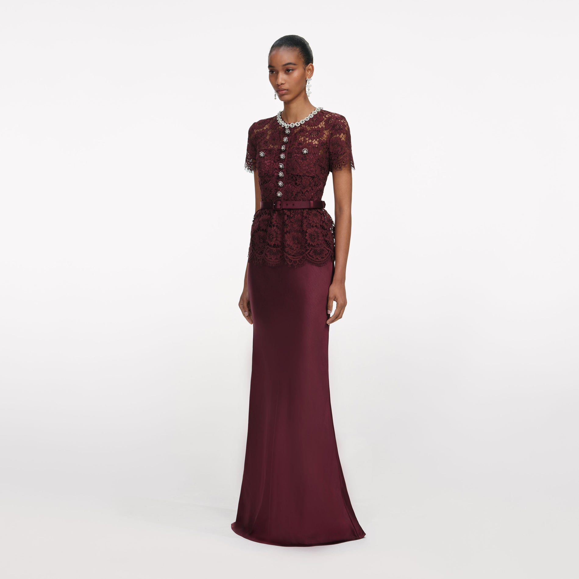 Side view of a woman wearing the Bordeaux Lace Satin Maxi Dress