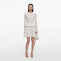 White Pointelle Peplum Knit Mini Dress