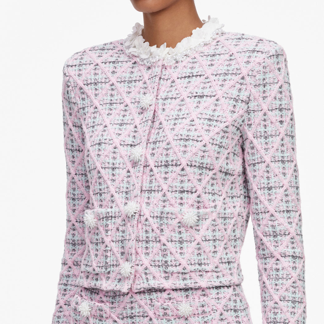 Pink and blue tweed jacket with pearl buttons and a ruffled collar