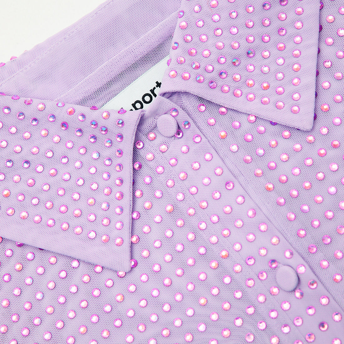 A close up of the fabric for the Lilac Rhinestone Mesh Shirt