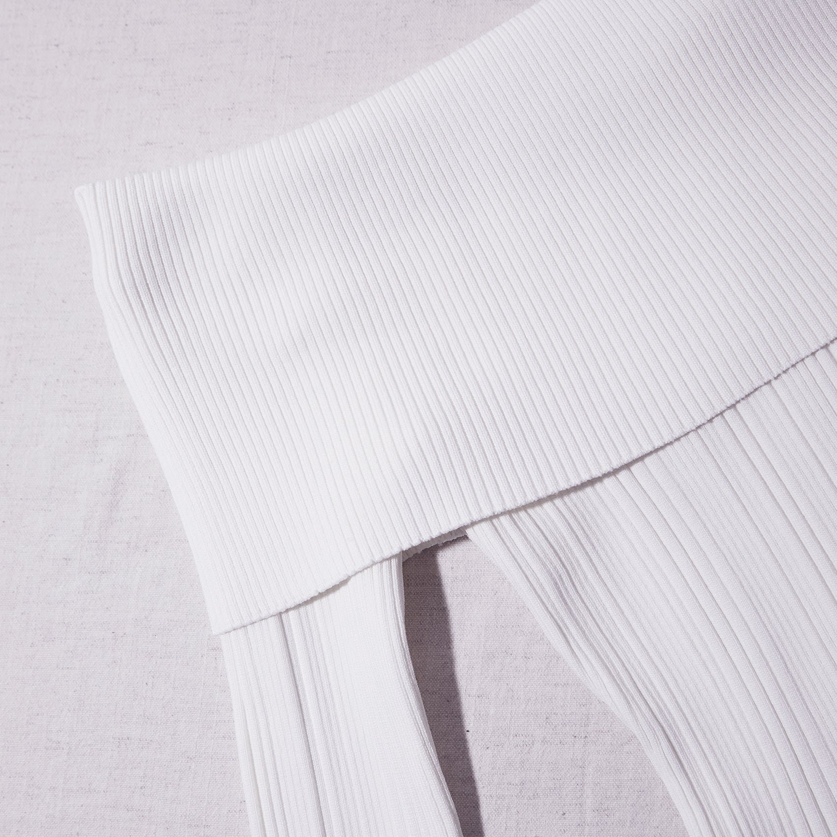 A close up of the fabric for the White Knit Mini Dress