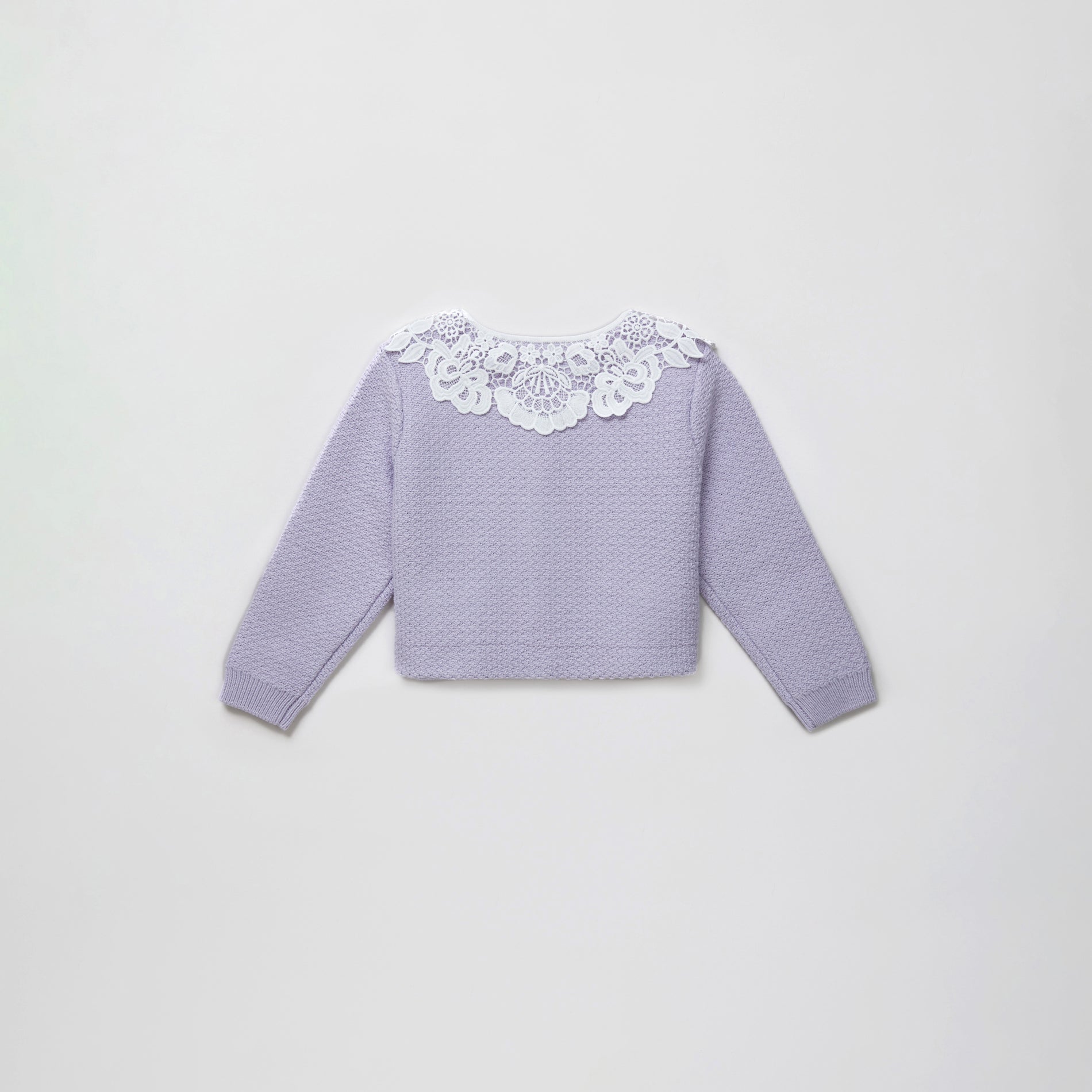 Side view of a woman wearing the Lilac Knit Lace Collar Cardigan