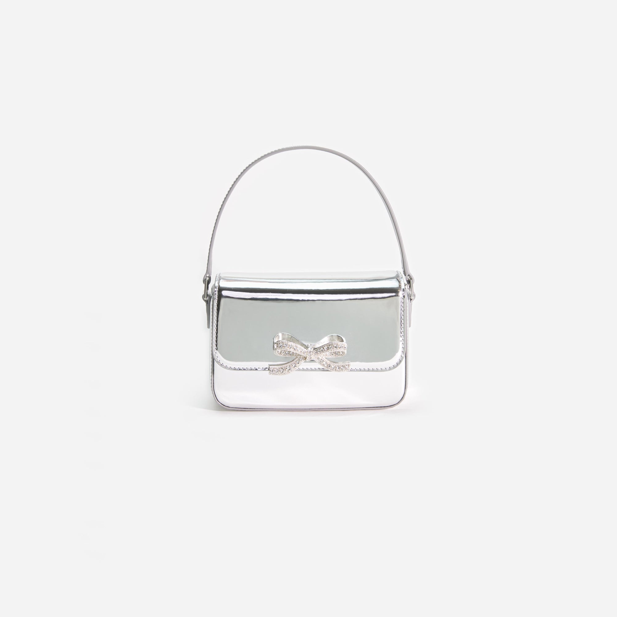 Front view of a woman wearing the Silver Leather Micro Bag