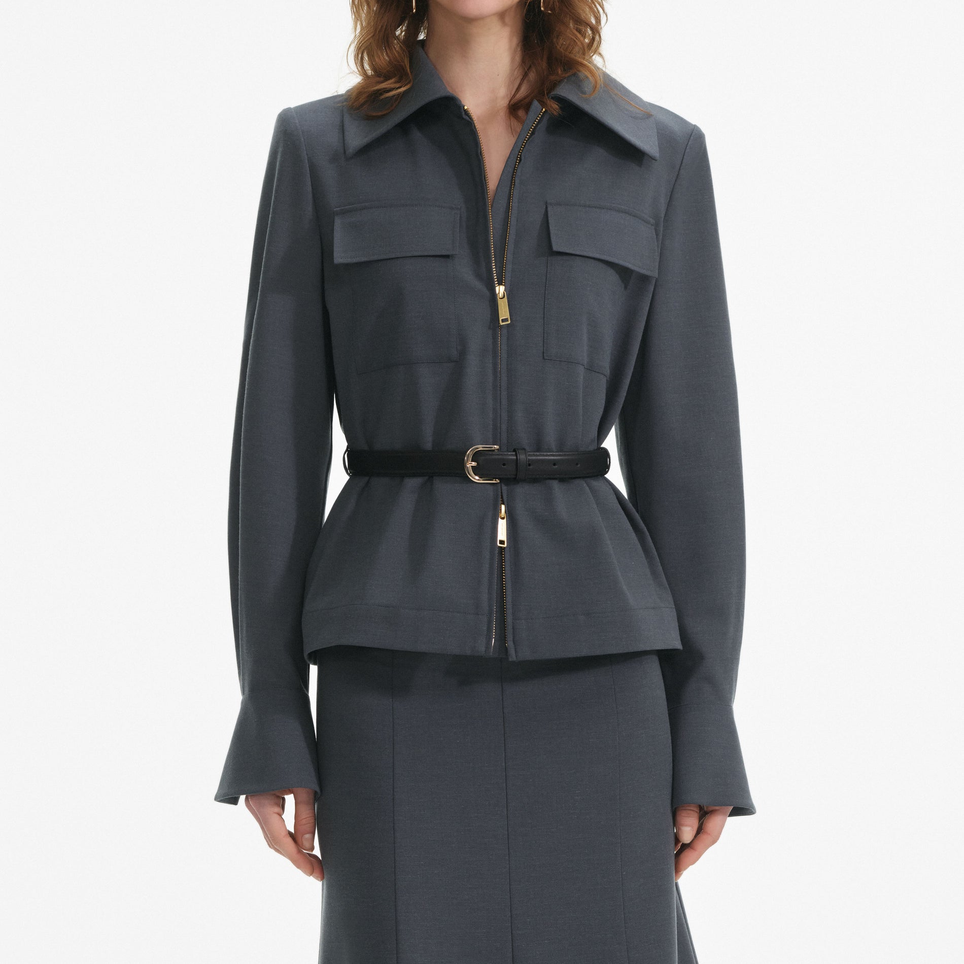 A close up of a woman wearing the Grey Twill Midi Dress